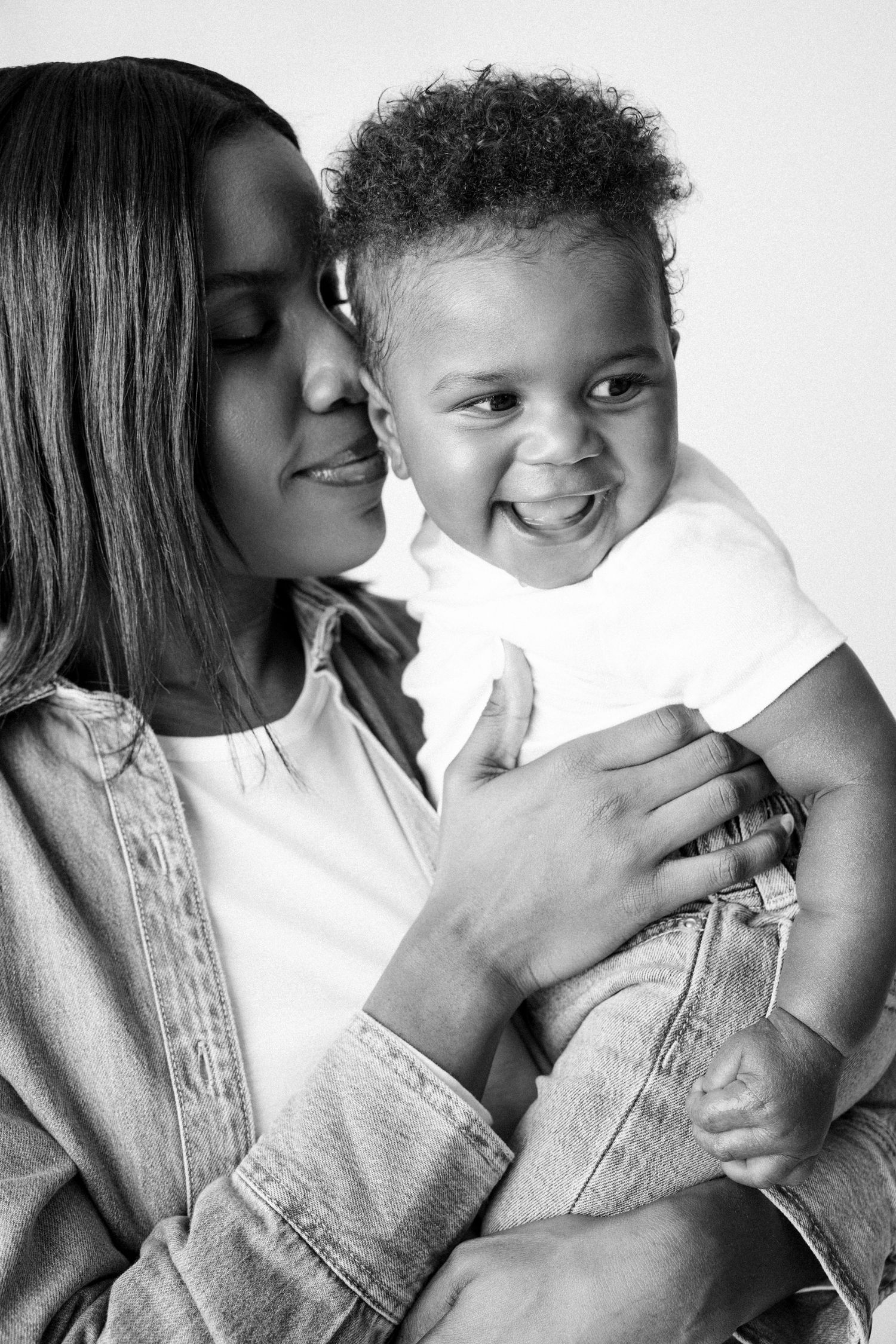 Black and white photo series showing tender moments of affection and playfulness between two people.