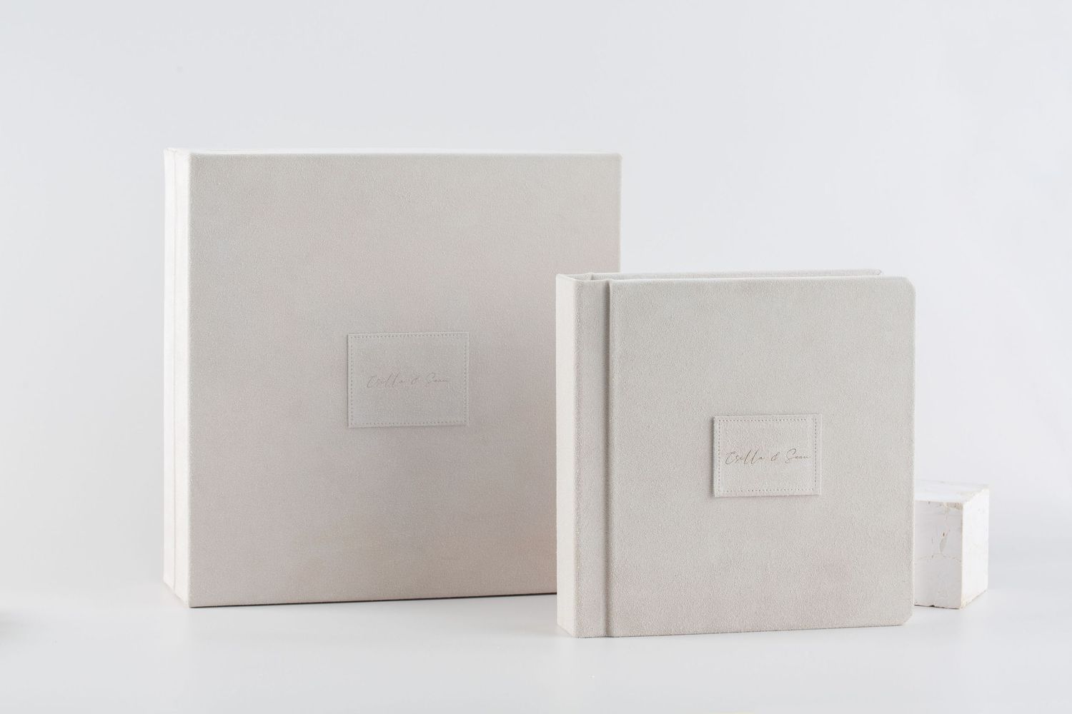 Minimalist white boxes and packaging containers arranged in a clean product display layout.