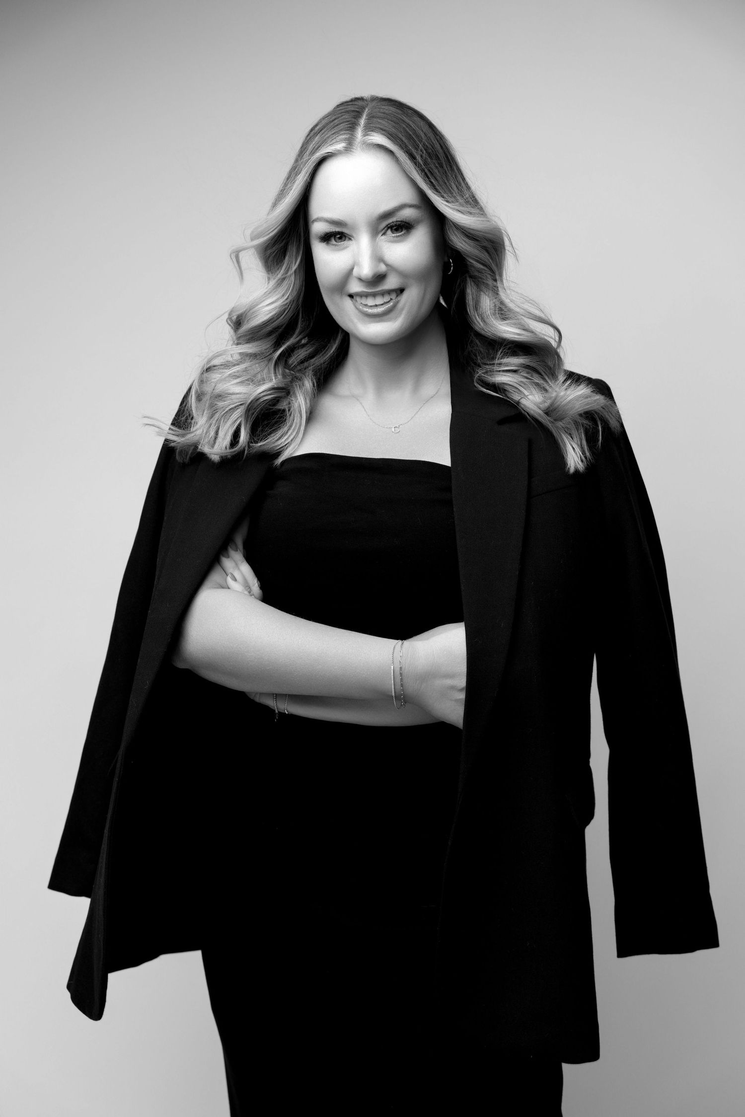 Black and white headshot of a woman captured by a Michigan photographer