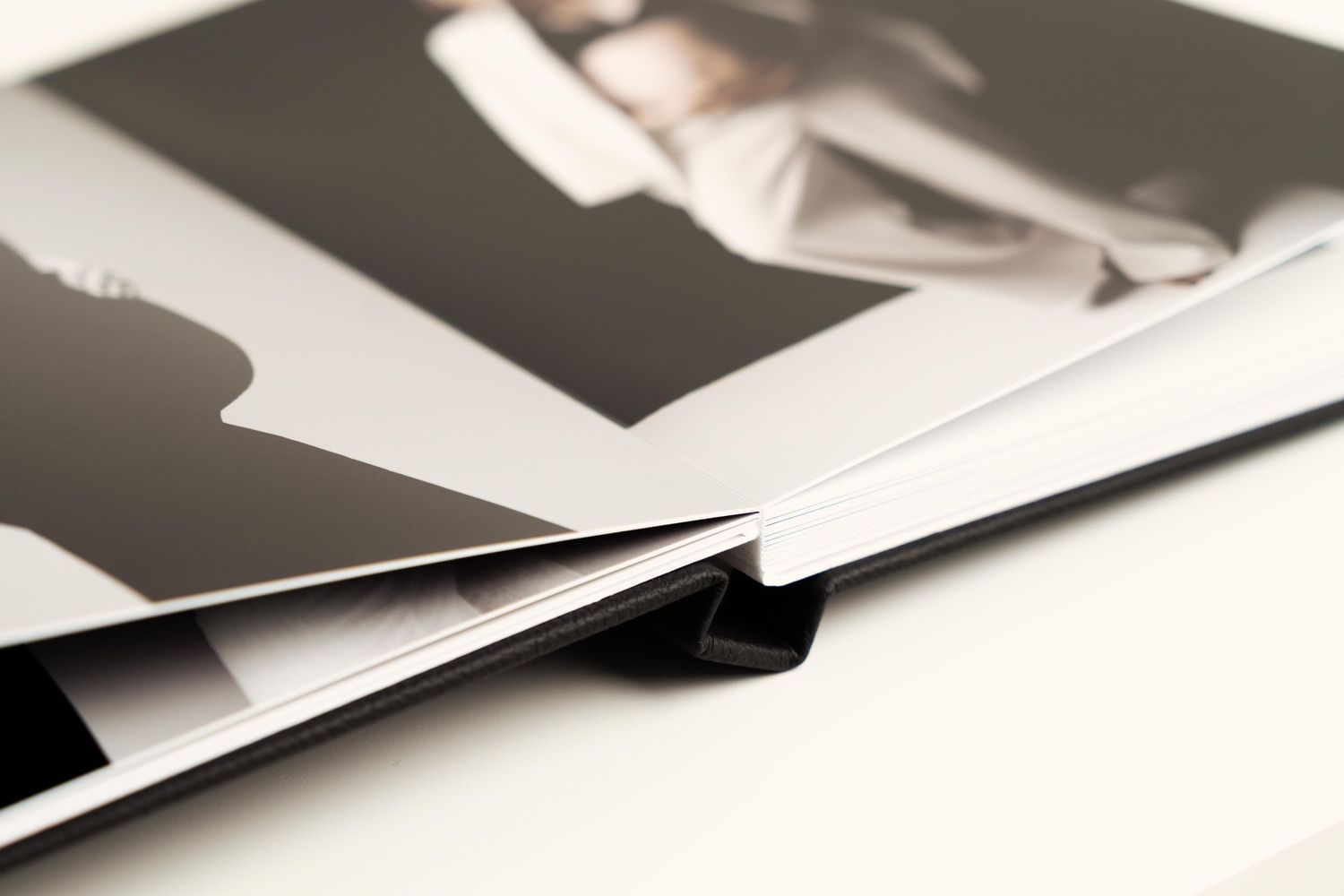 Close-up black and white photo of sharp diagonal lines and geometric shapes creating an abstract pattern.