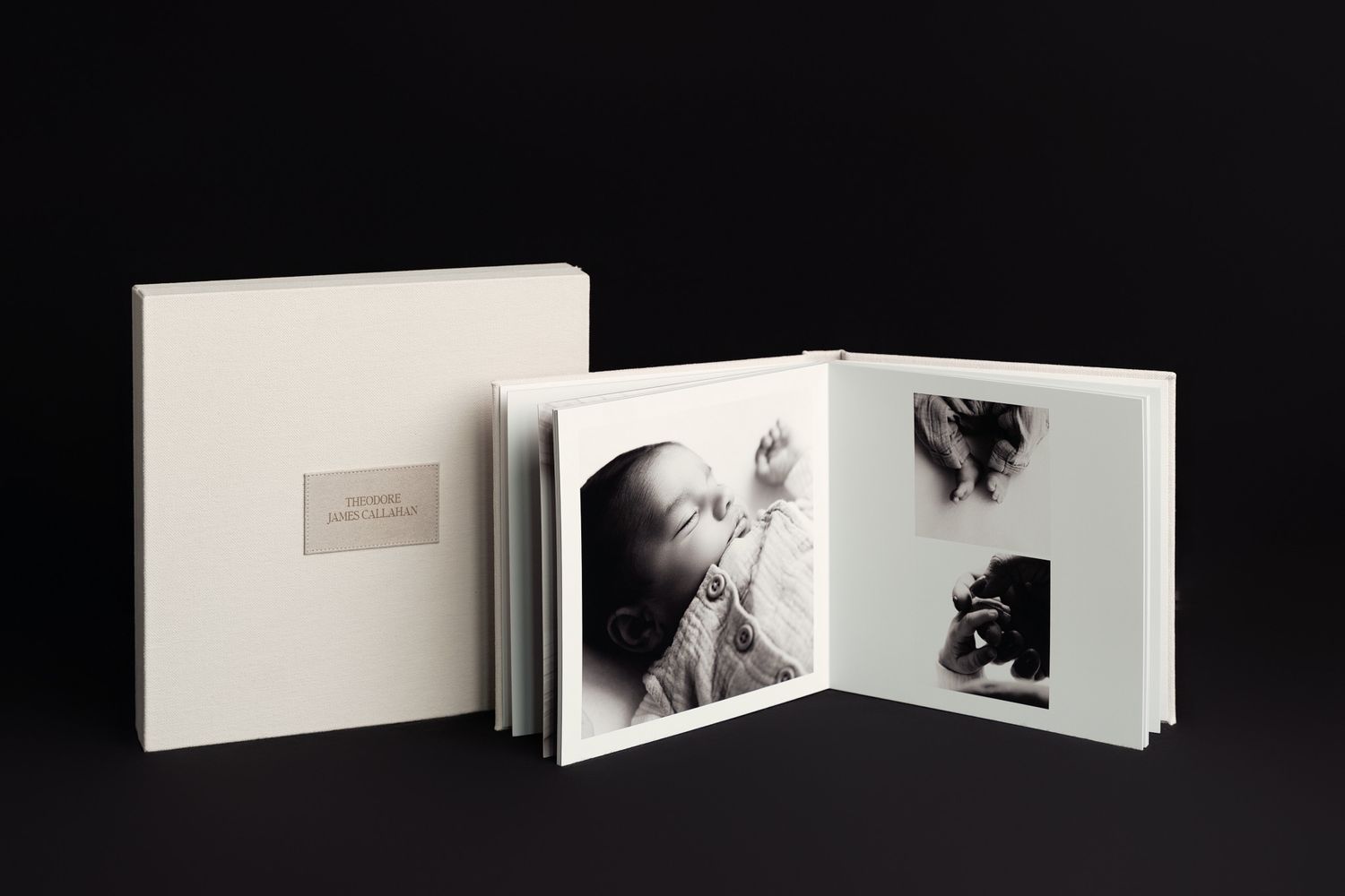 White art book or photo album displayed in various angles showing minimalist black and white photography layouts.