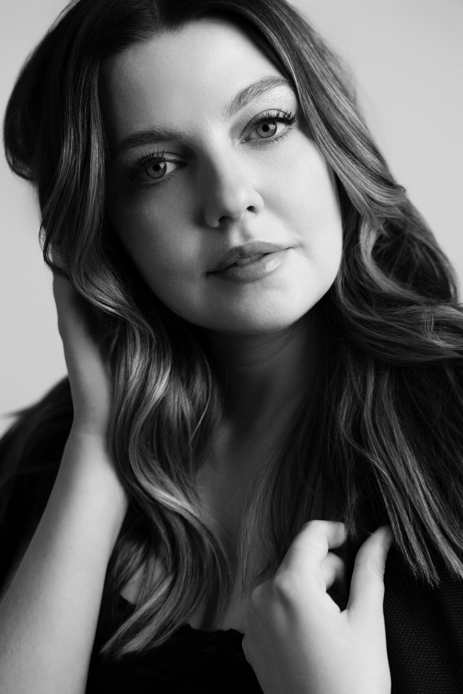Intimate black and white beauty portraits with soft lighting and natural expressions.