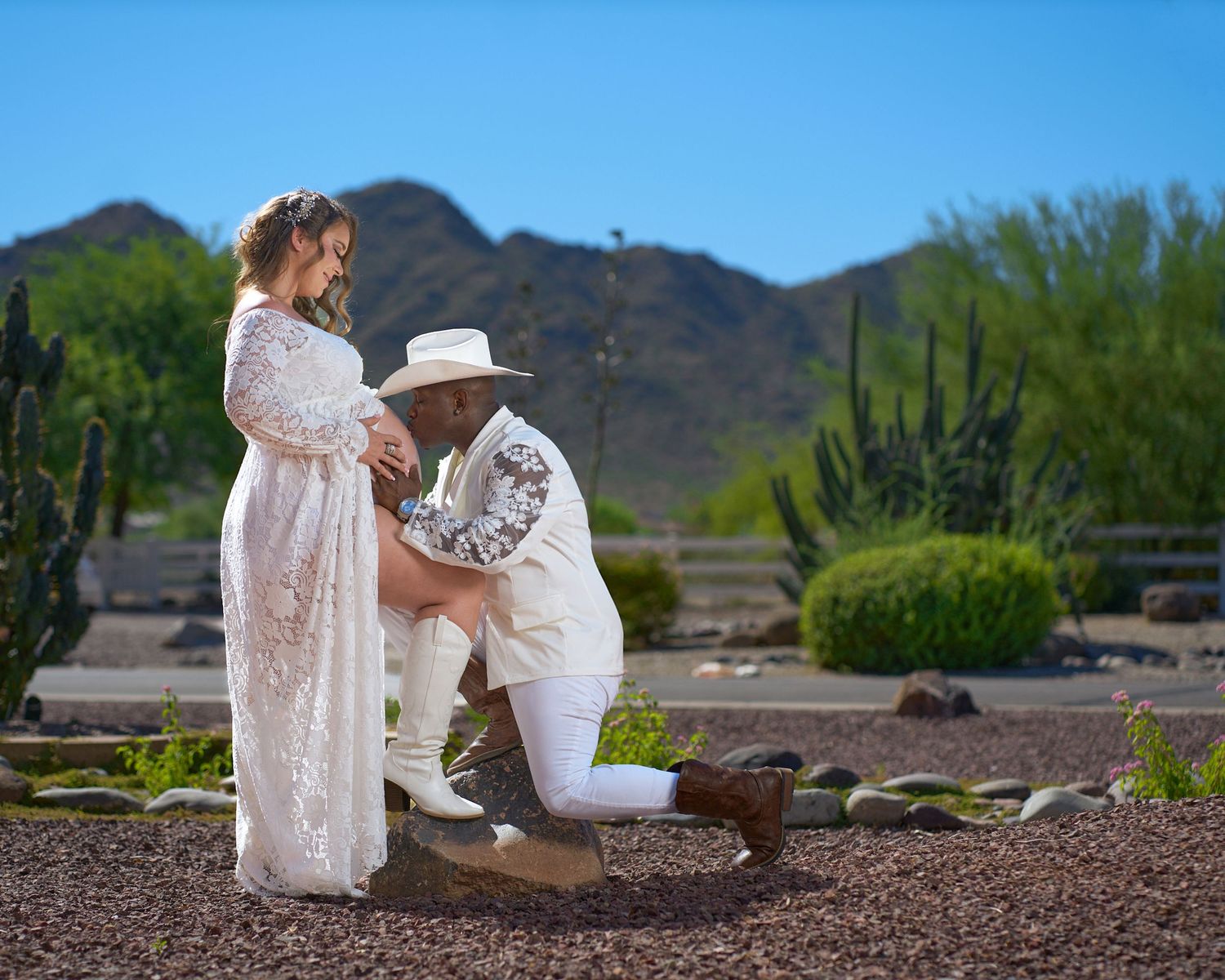 Desert landscape photoshoot with white lace dresses and natural scenery. Photographer RL Davis
