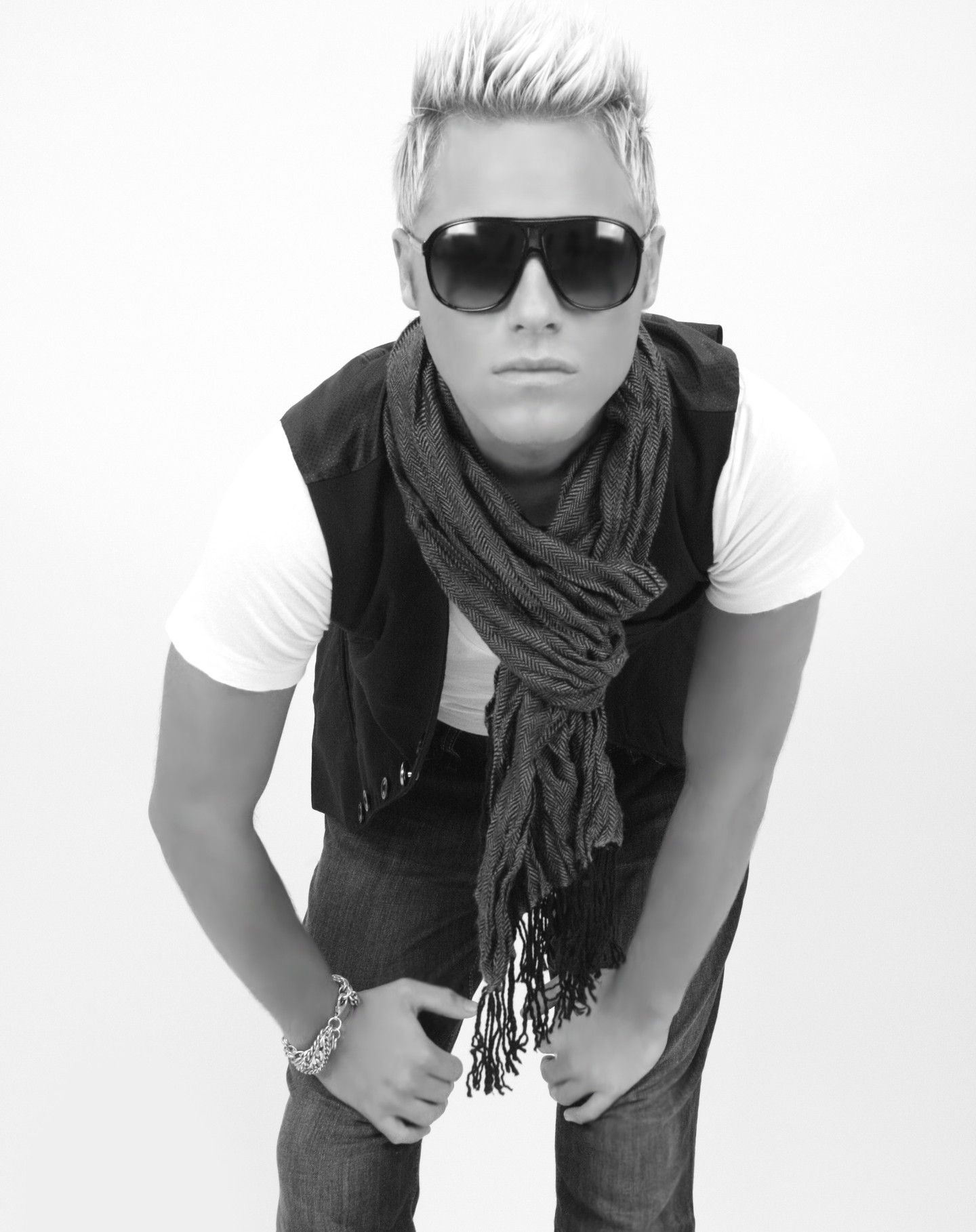 Black and white fashion portraits showing person in sunglasses and scarf. Photographer RL Davis