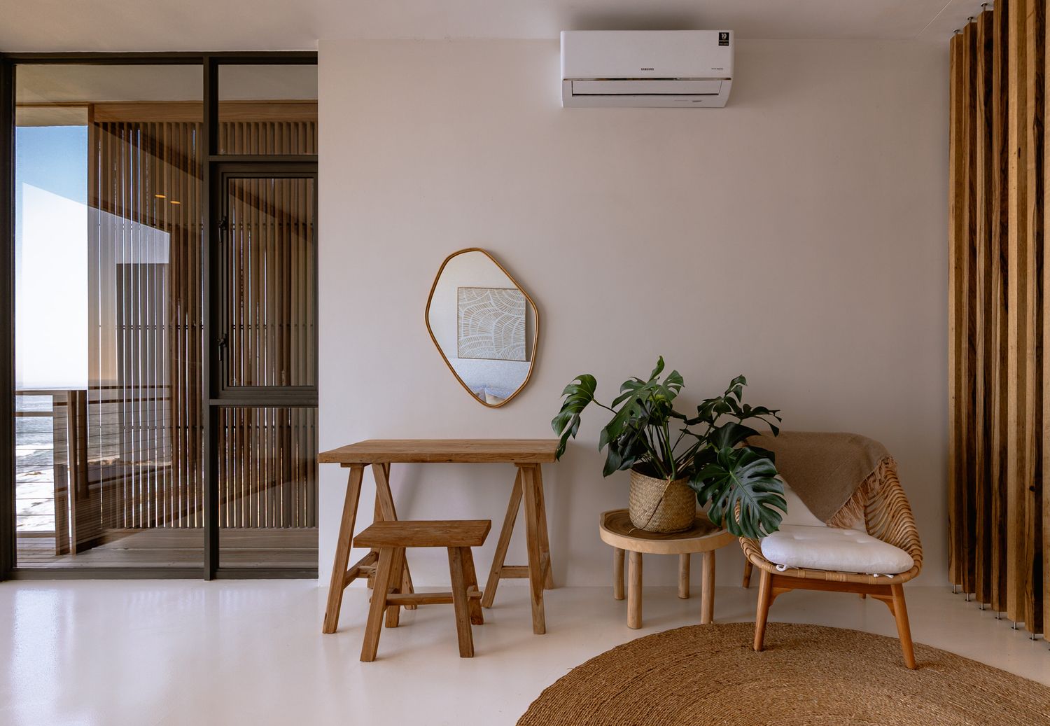 Modern interior with wooden room dividers and natural materials creating a zen atmosphere.