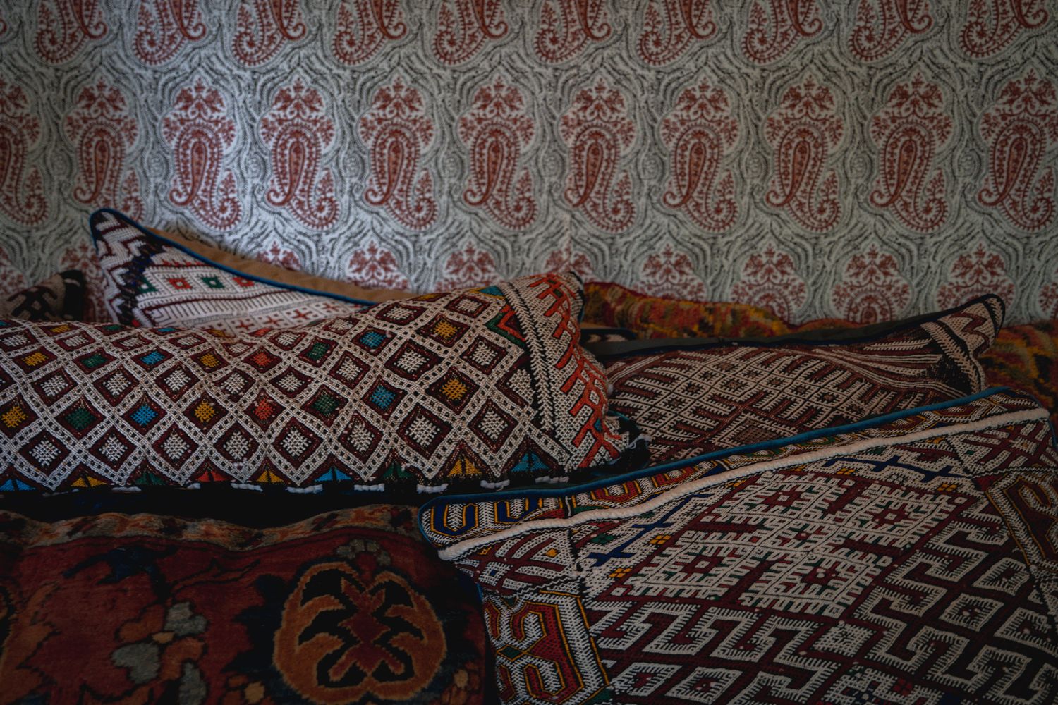 Close-up of decorative textiles featuring intricate geometric patterns and designs.