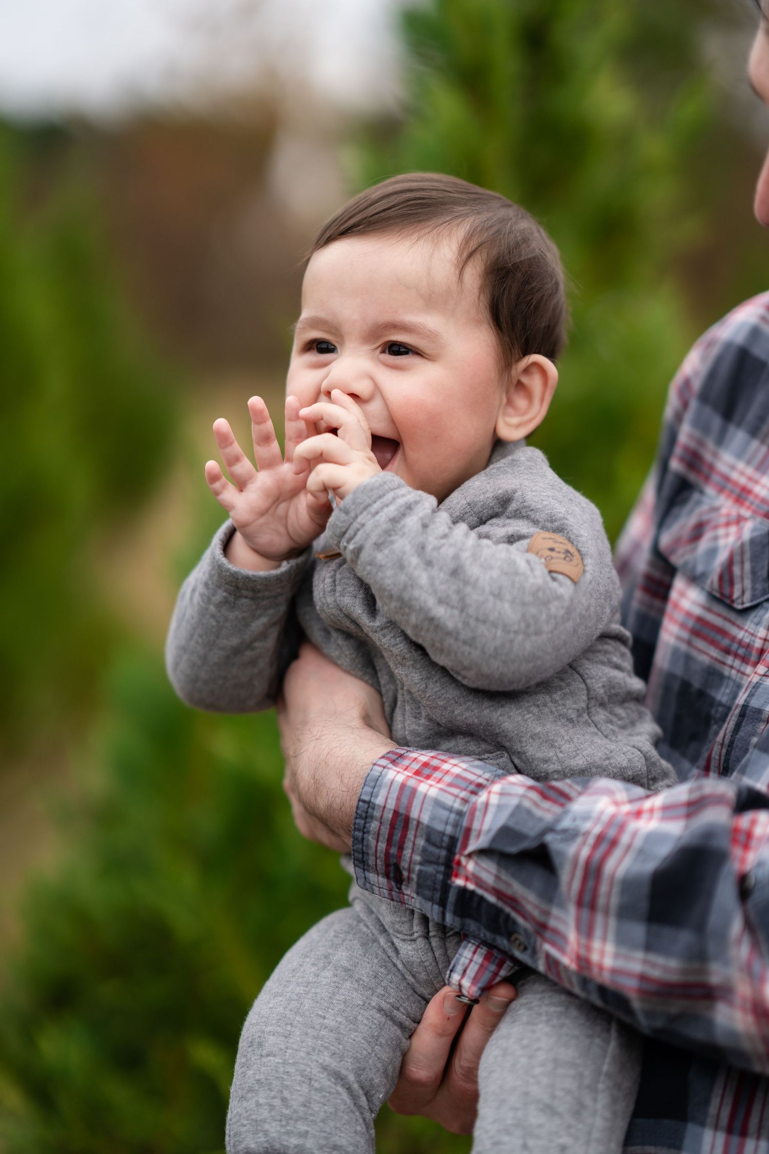 Playful expressions and interactions captured in a natural outdoor setting.