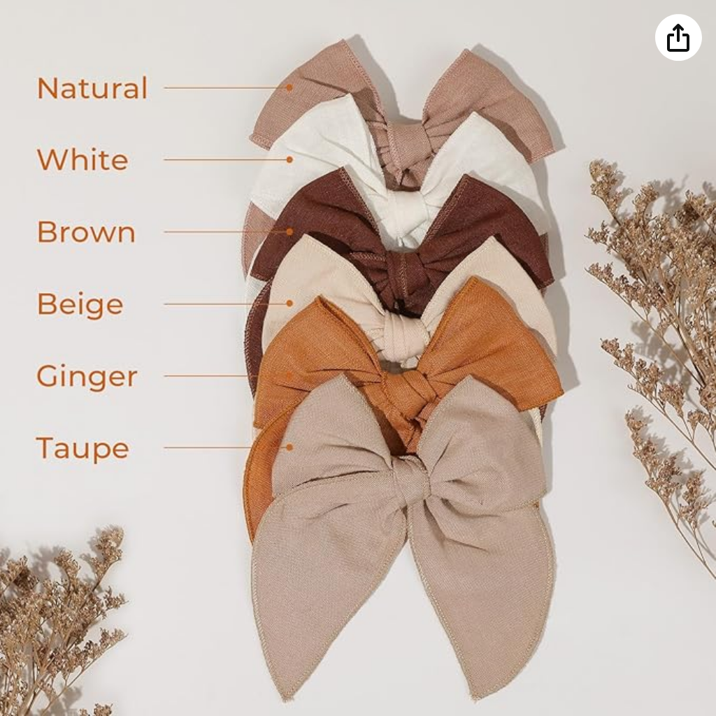 Collection of fabric hair bows in neutral colors including natural, white, brown, beige, ginger, and taupe.