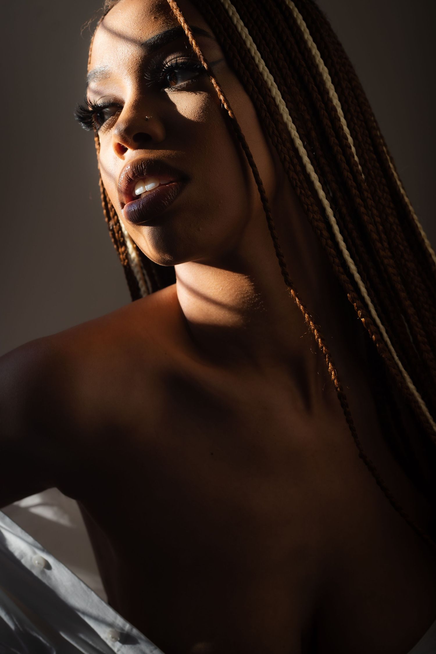 moody editorial portrait in natural light