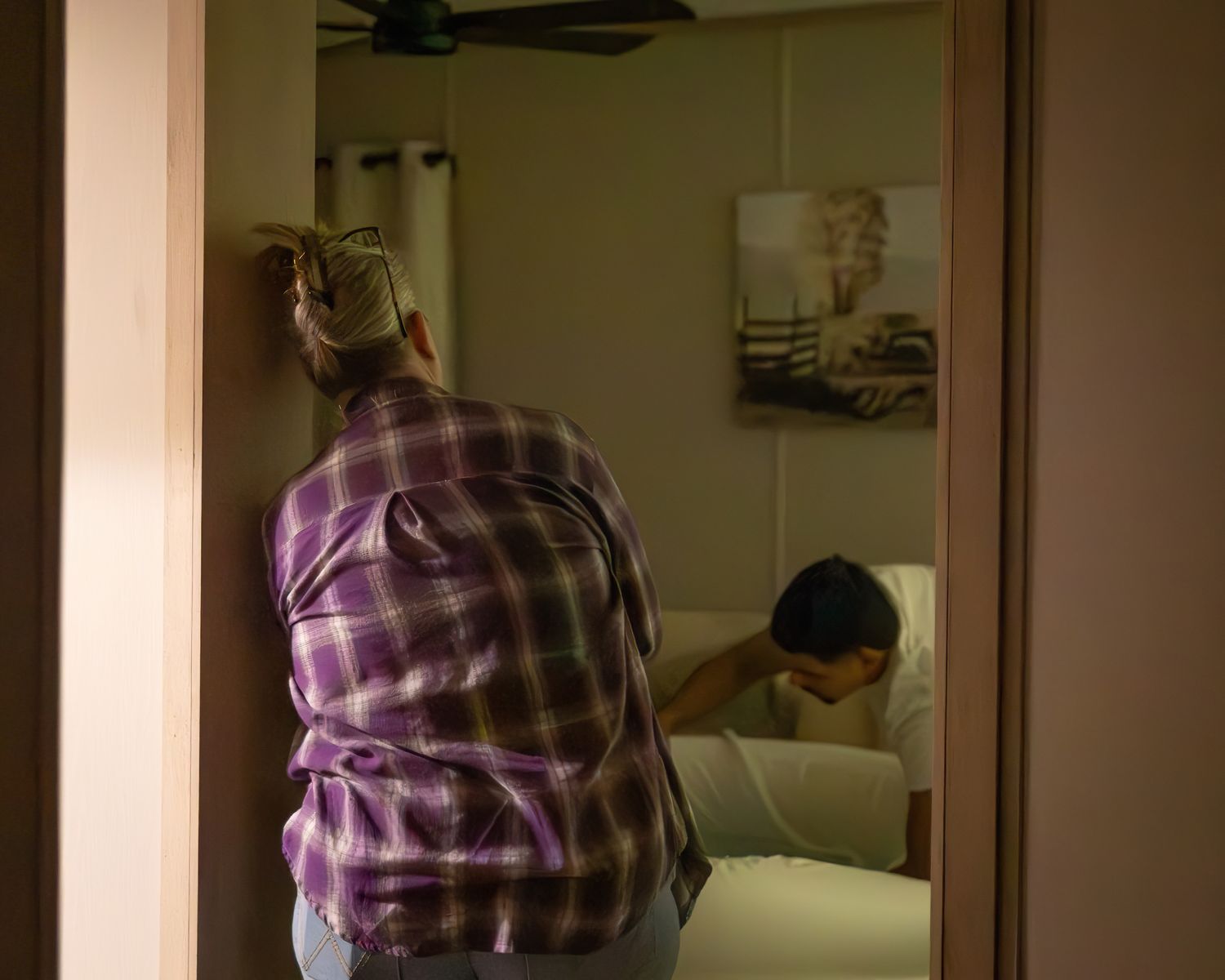 Midwife quietly observing labor at homebirth in Wise County