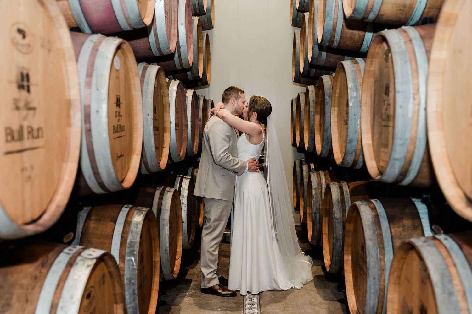 Private vows amongst the wine barrels at The Winery at Bull Run