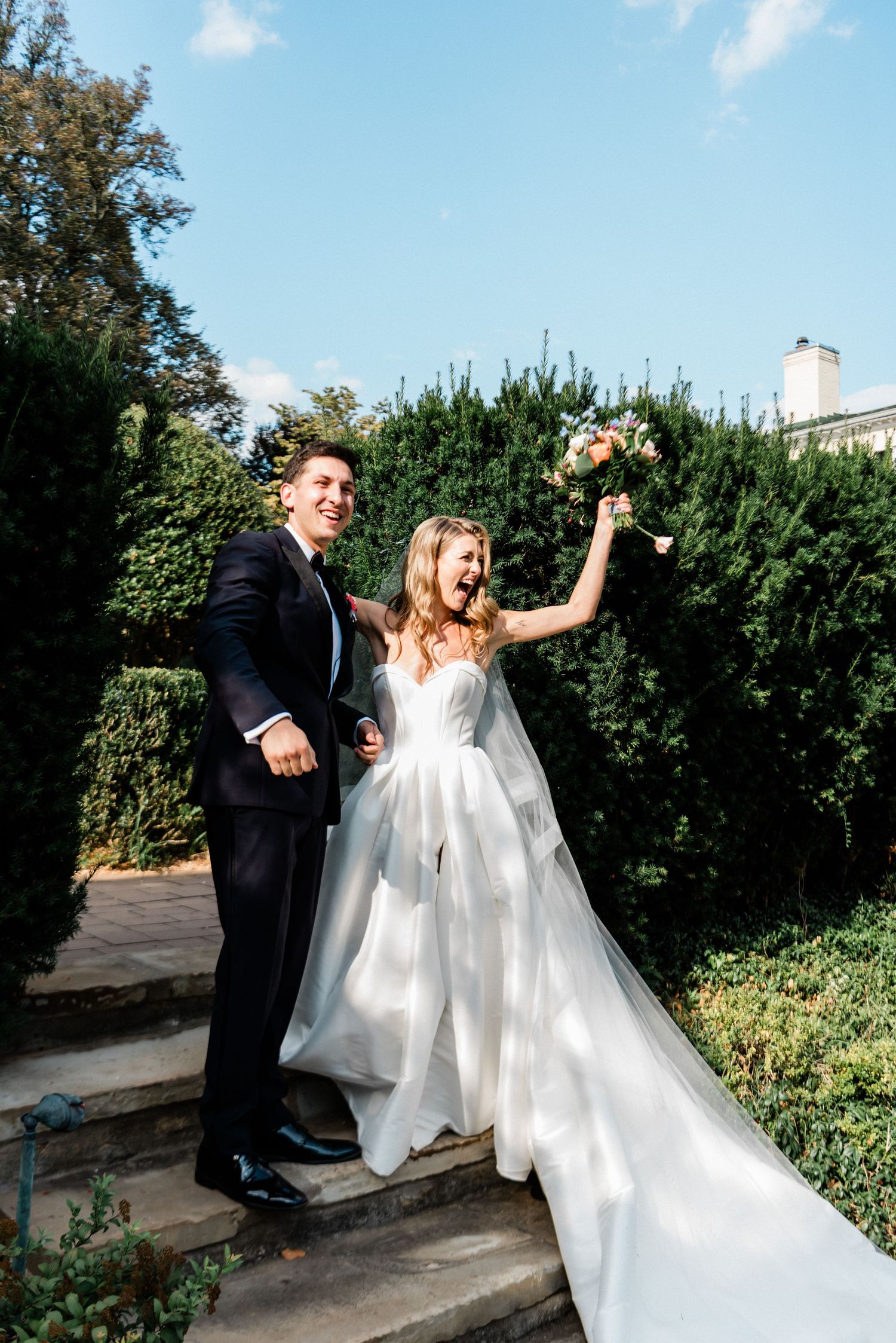 Couple celebrating just getting married- Airlie wedding ceremony- Warrenton, Virginia