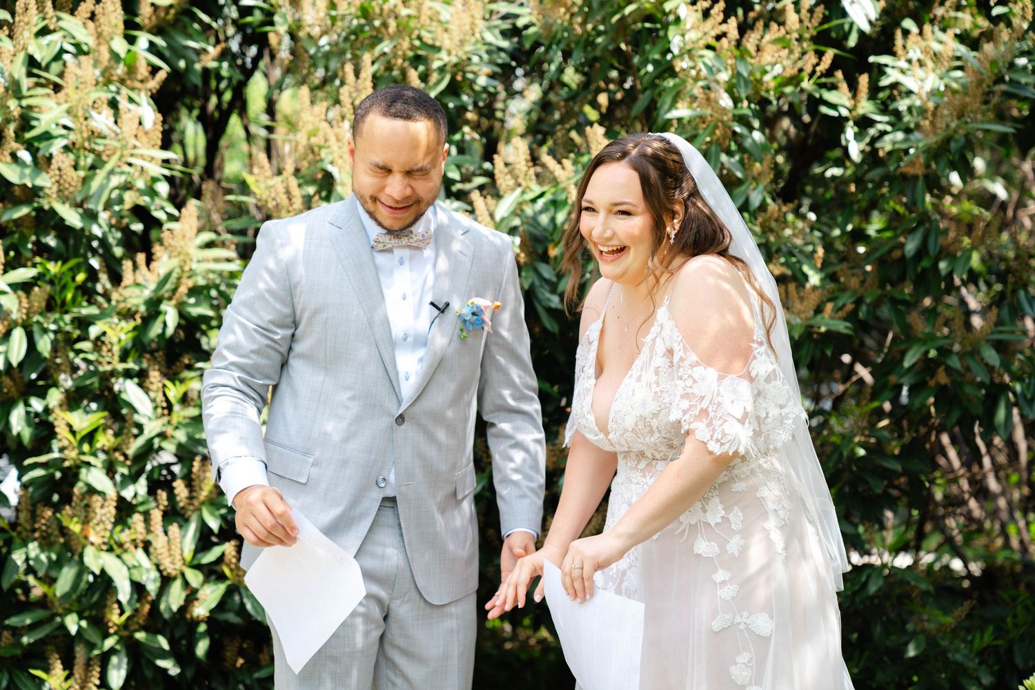 Bride and groom laughing off the nerves after their first look/vow reading at the Vandiver Inn, Havre De Grace, MD.
