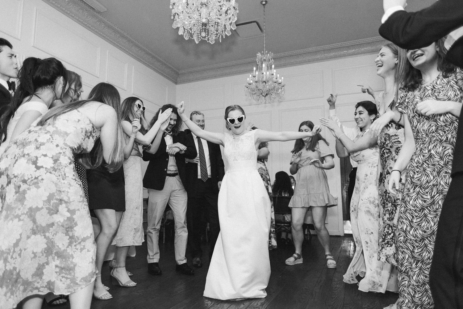 Bride dancing it up at wedding reception held at Cedar Knoll in Alexandria, Virginia