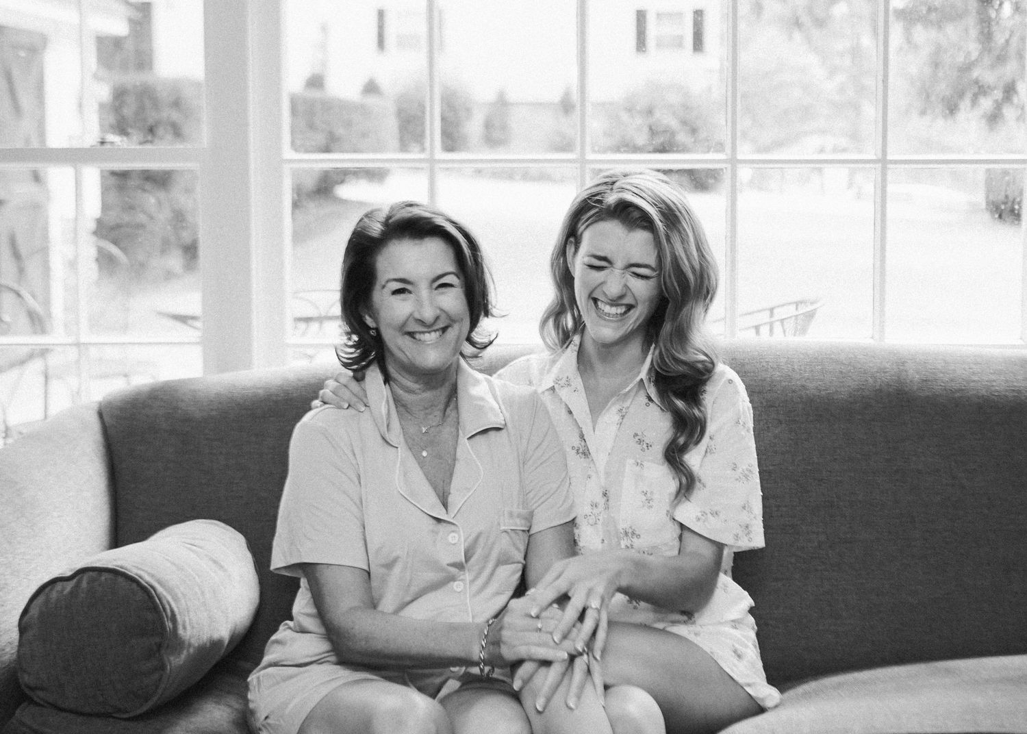 Black and white photo of bride and her mother smiling together- Airlie, Warrenton, Virginia