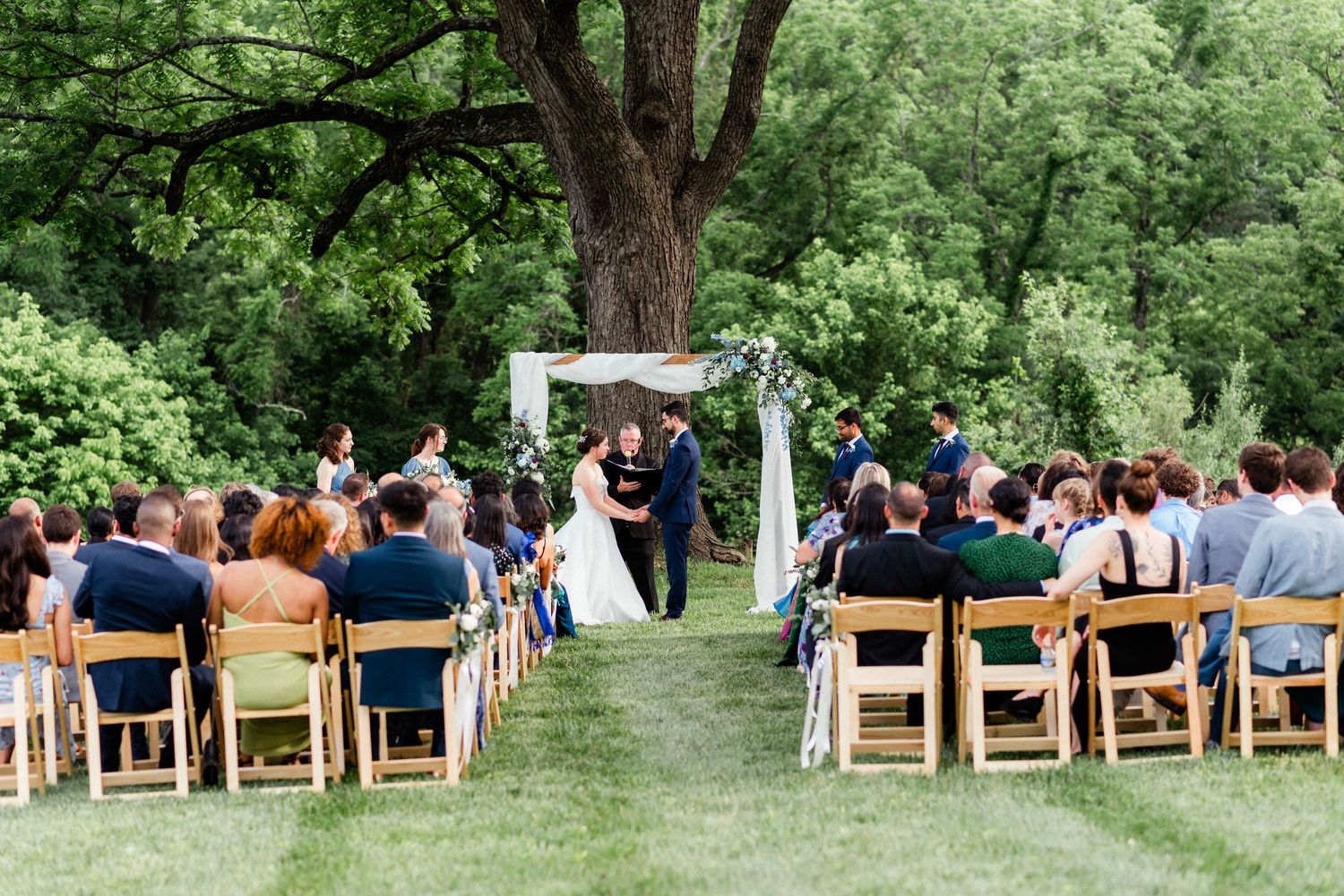 Wedding ceremony outside at Old Farm Winery at Hartland