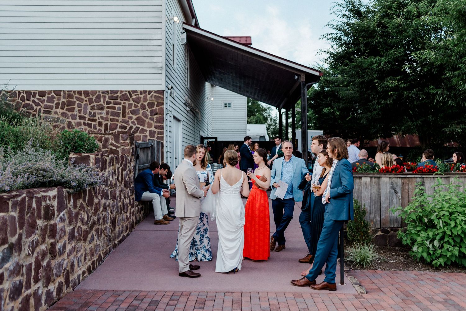 Couple enjoying their guests at cocktail hour- Winery at Bull Run