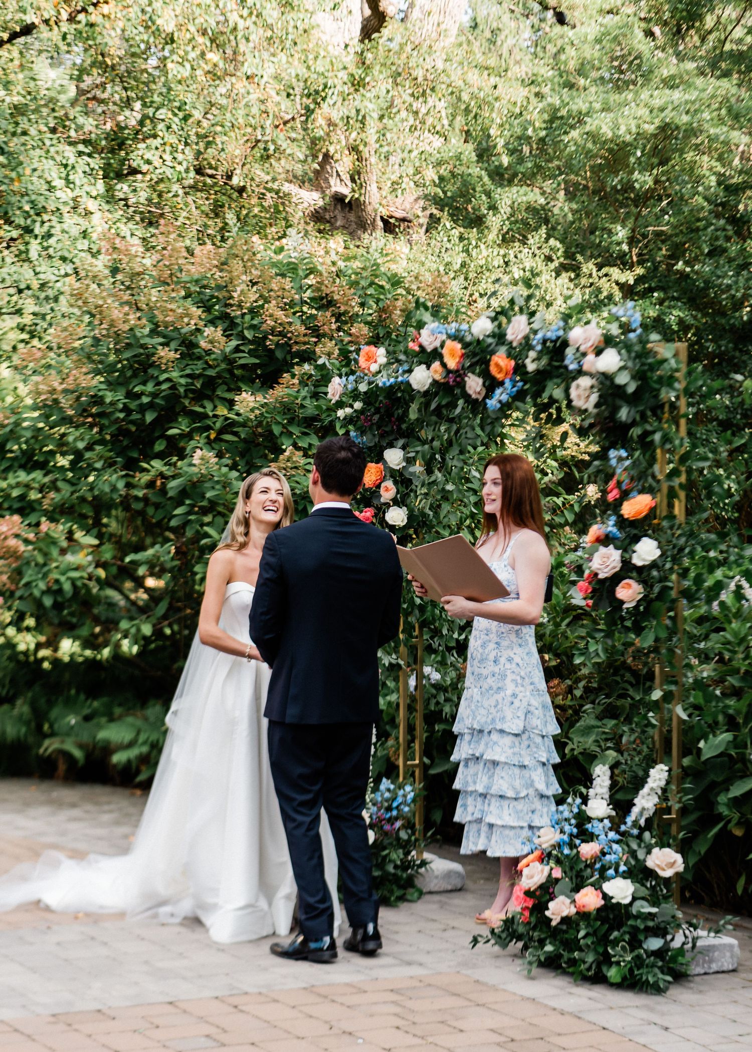 Bride sharing a laugh with the groom during wedding ceremony- Airlie, Warrenton, Virginia