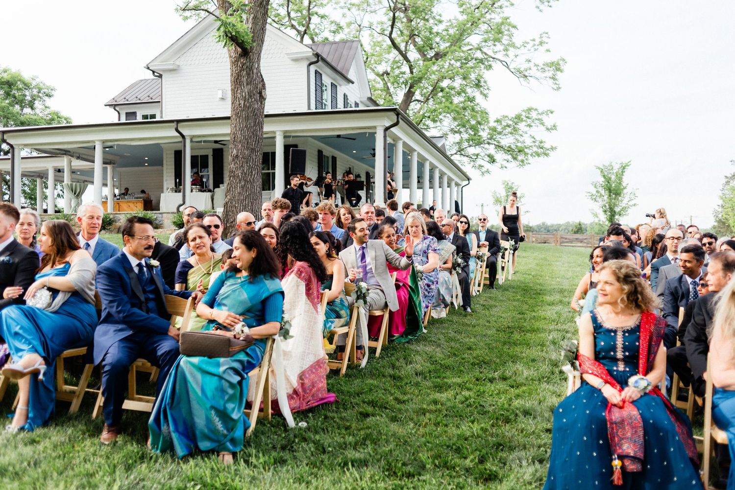 Ceremony space and guests at Old Farm Winery at Hartland wedding.