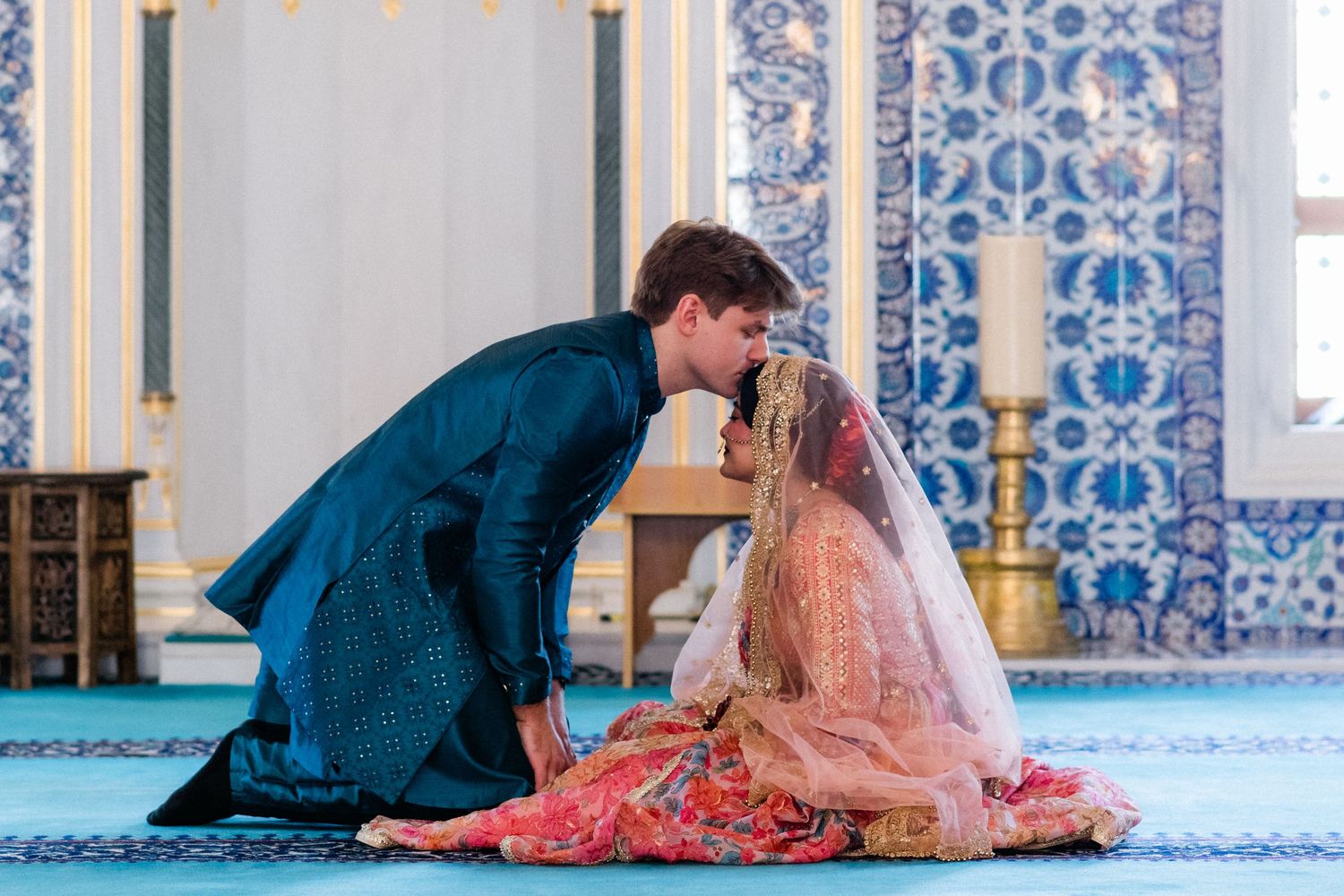 A couple sharing a moment at their ceremony at the Diyanet Center of America, in Maryland.