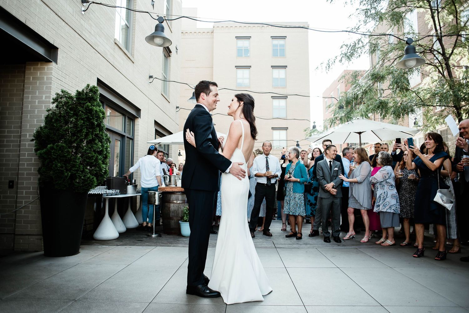 Bride and groom dancing at wedding reception held at Hummingbird Bar and Kitchen in Alexandria, Virginia