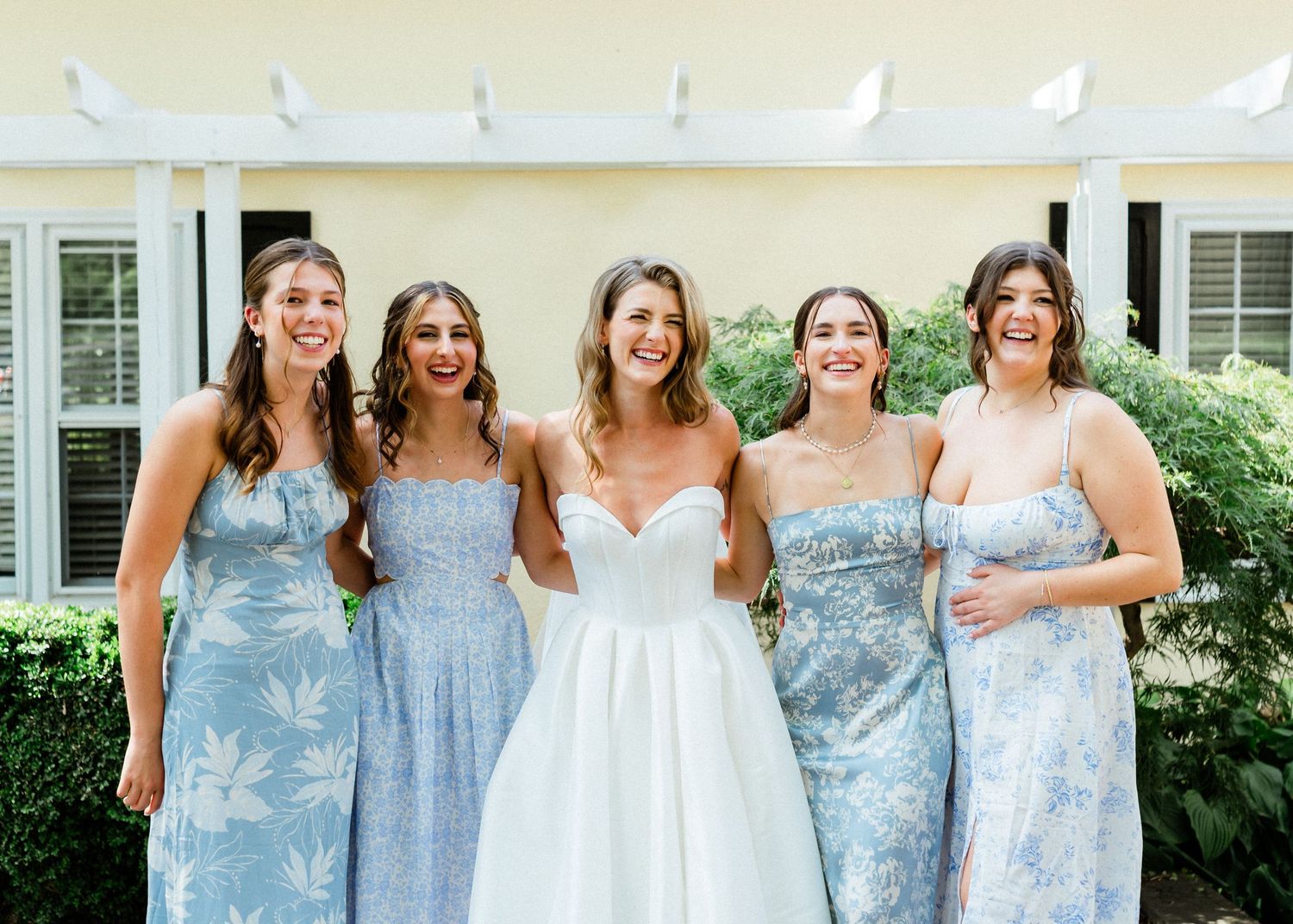 Bride and her bridesmaids sharing a laugh- Post Room- Airlie, Warrenton, Virginia