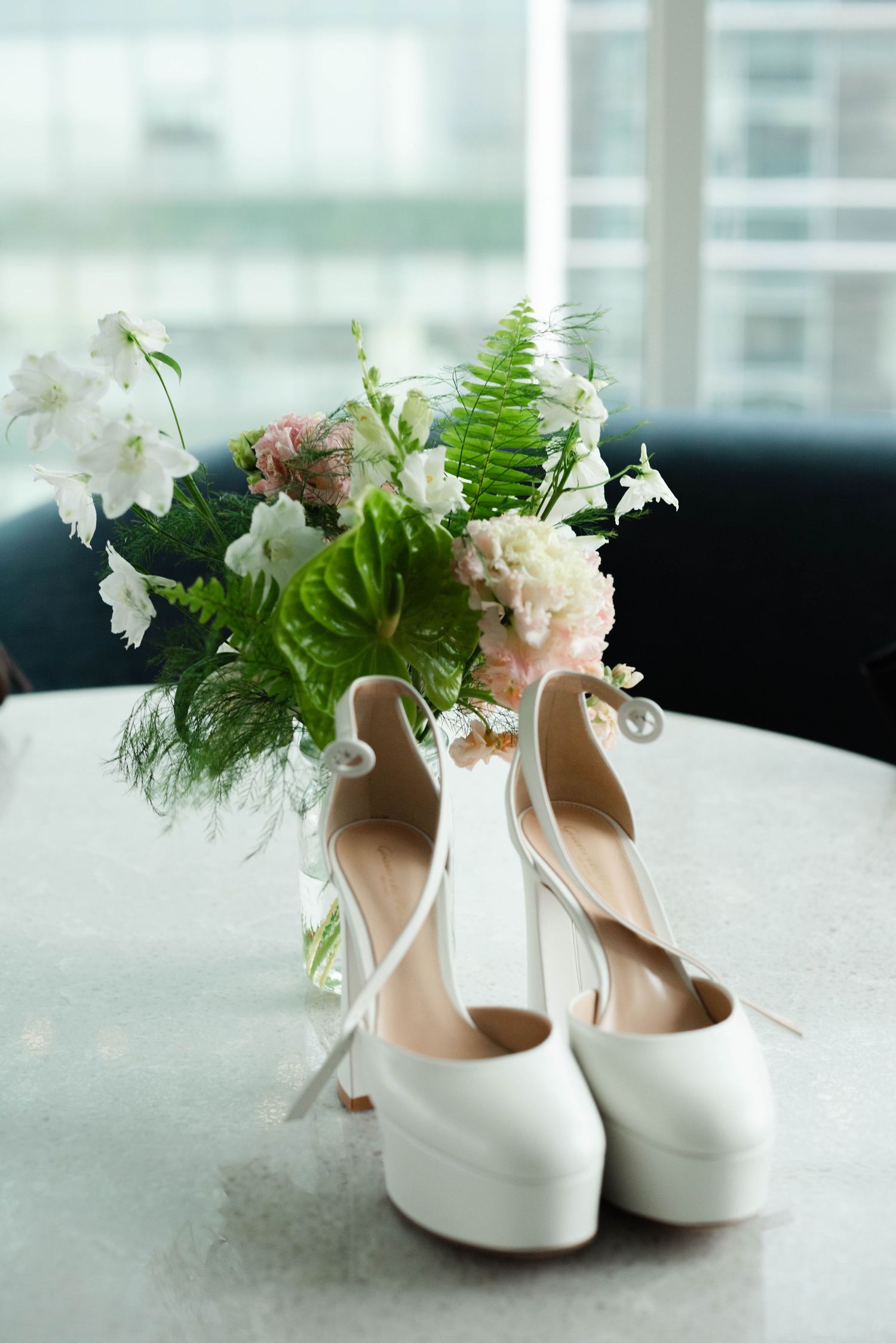 The bride's shoes and florals.