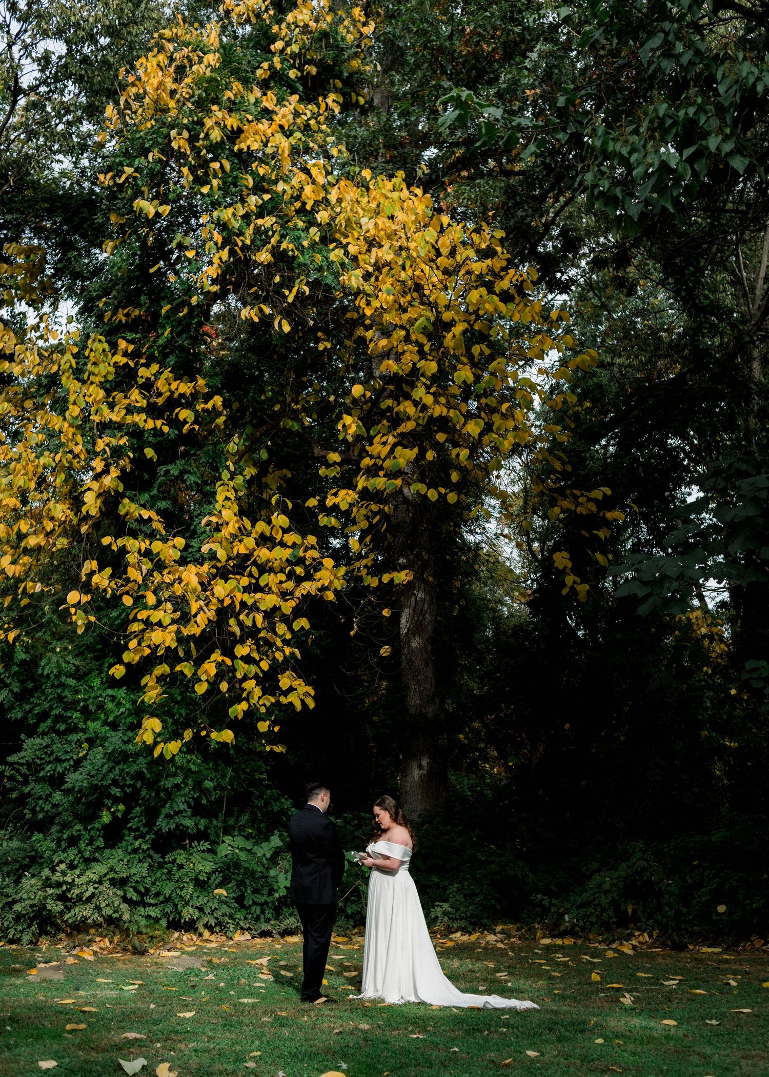 Bride and groom sharing vows at Rust Manor Wedding Venue