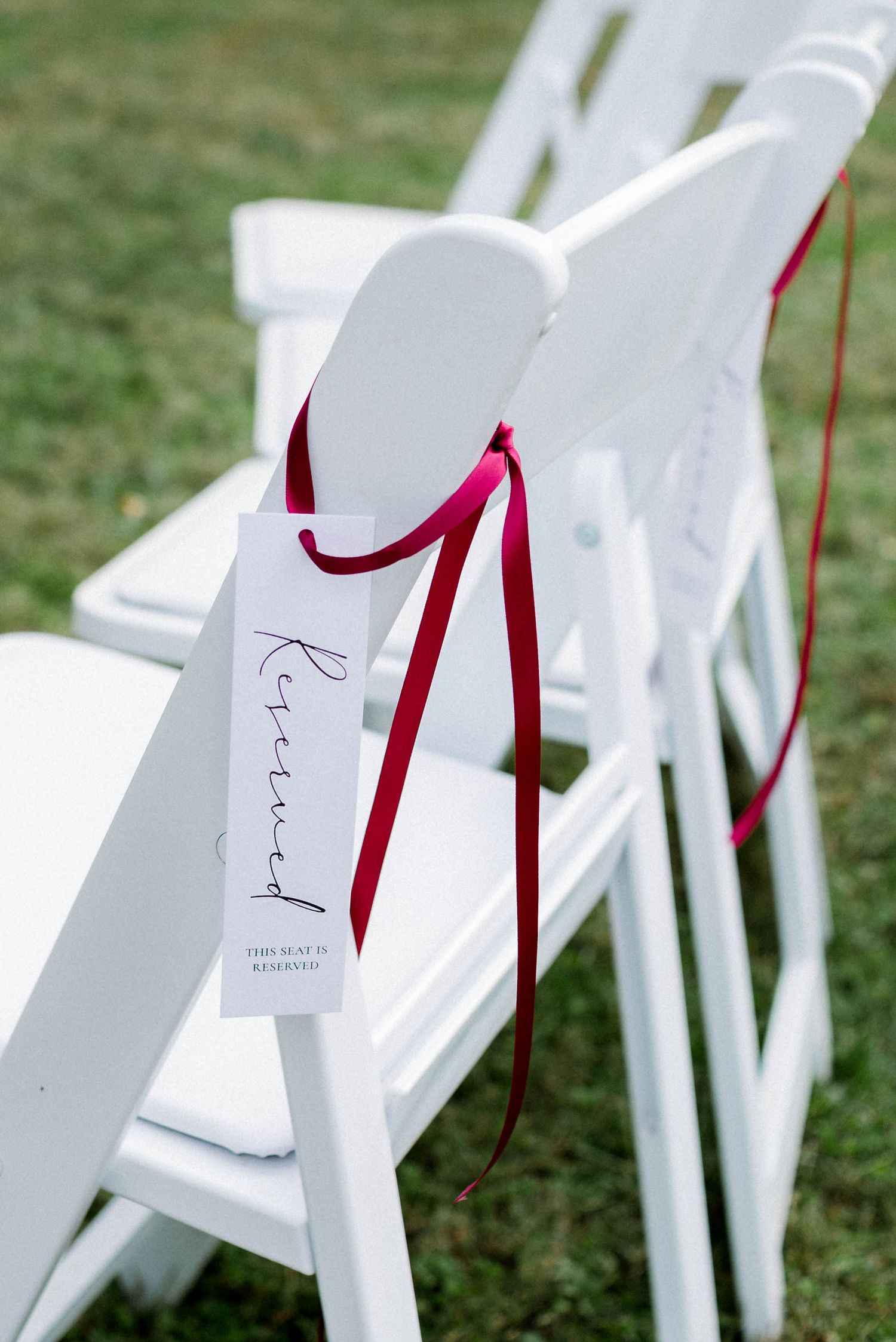Rust Manor House wedding ceremony chair with reserved sign