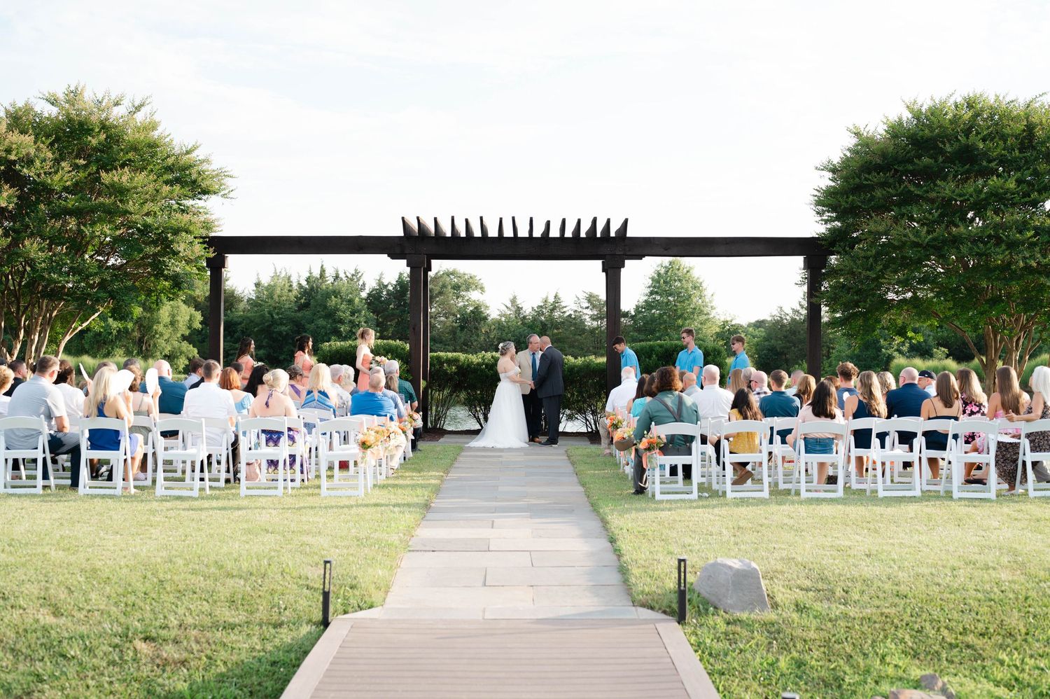 Old House Vineyards wedding ceremony over the water, Culpeper, Virginia