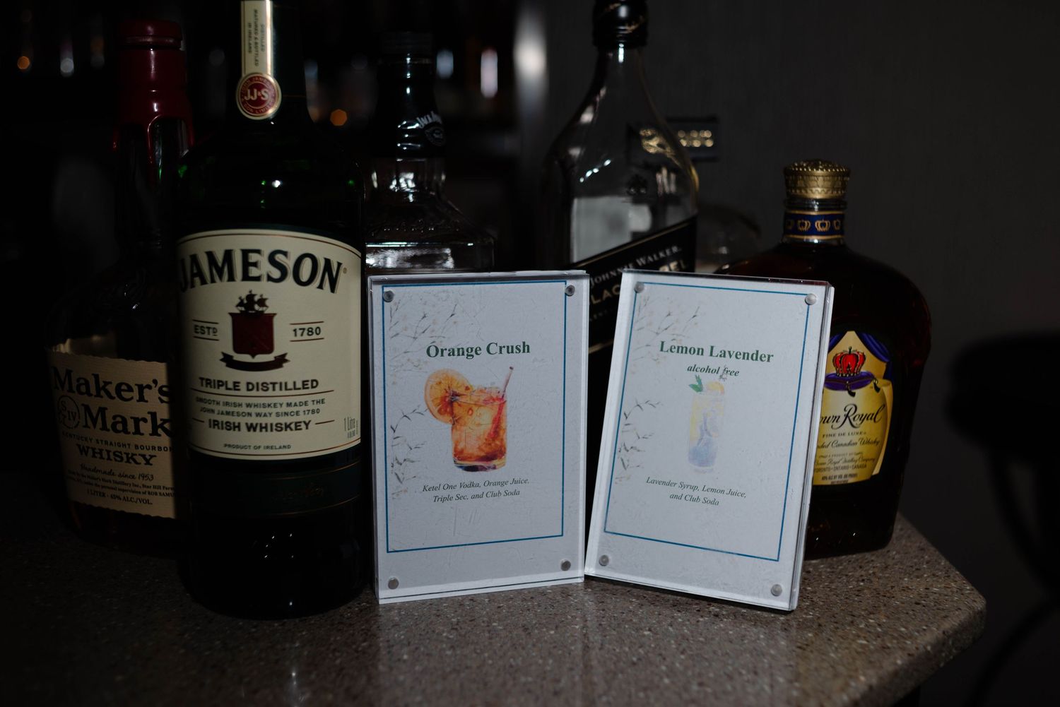 The couples' signature drink signs.