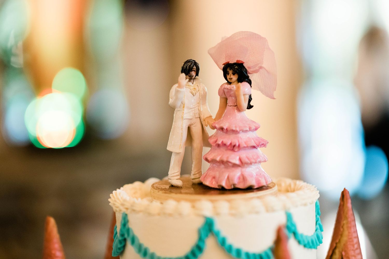 Personalized cake toppers on wedding cake at Great Marsh Estate reception