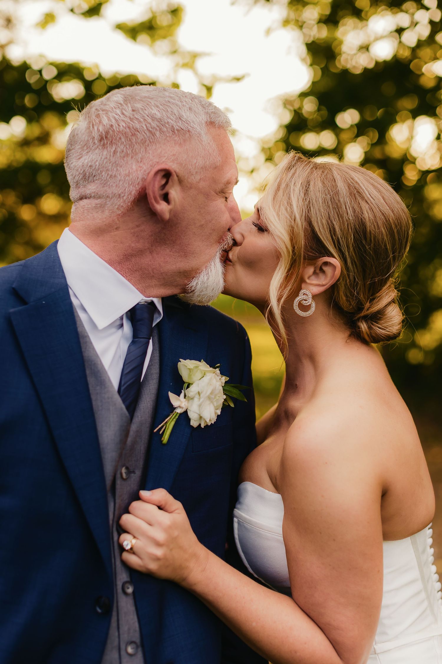 A romantic series of wedding photos showing a couple kissing during golden hour with a beautiful sunset glow.