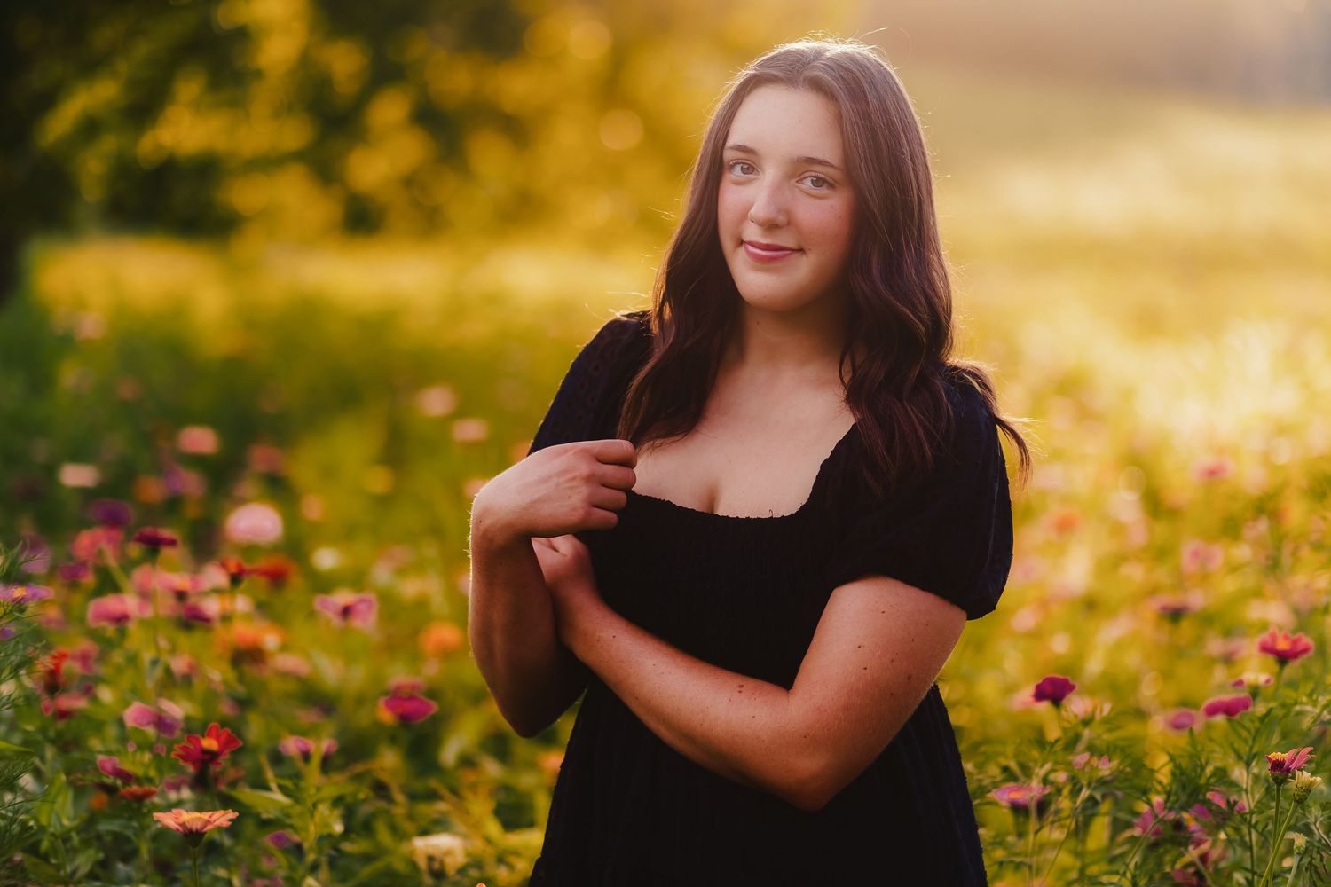 Portrait series showing joyful expressions against a warm sunset background with flowers.