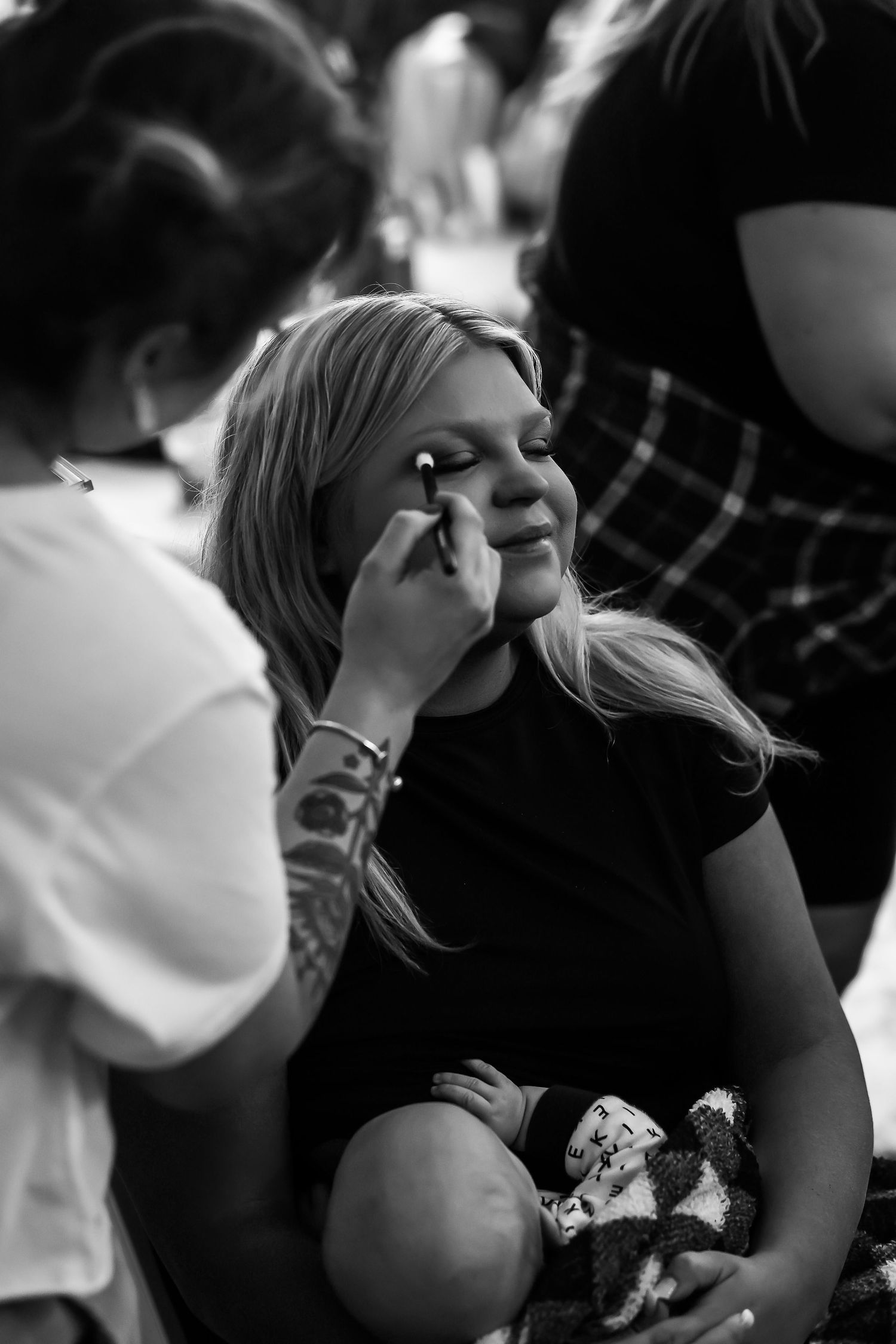 Black and white emotional candid moments during wedding speeches.