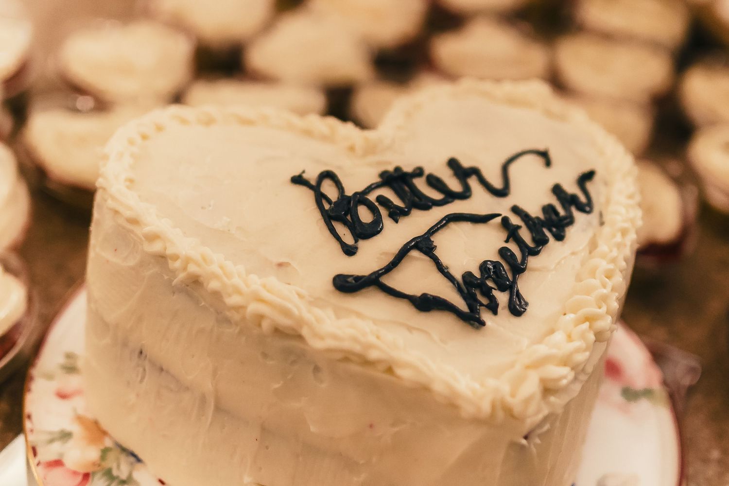 A slice of white frosted cake with 