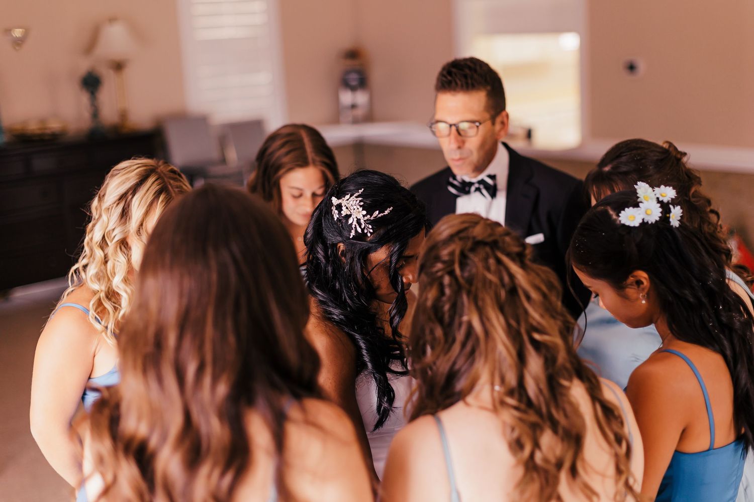 Candid pre-wedding preparation moments with soft natural lighting.