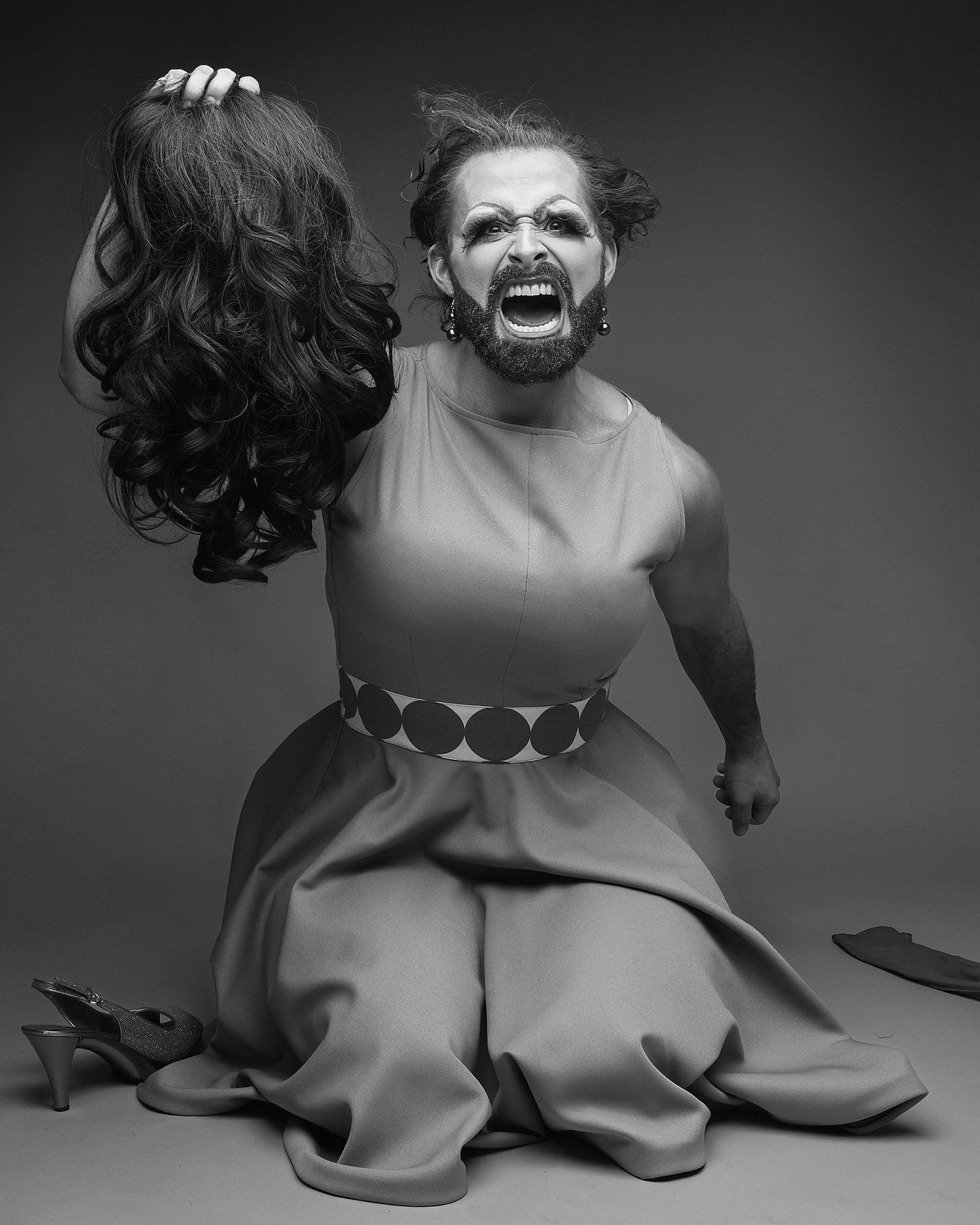 Dramatic black and white fashion poses in flowing dress.