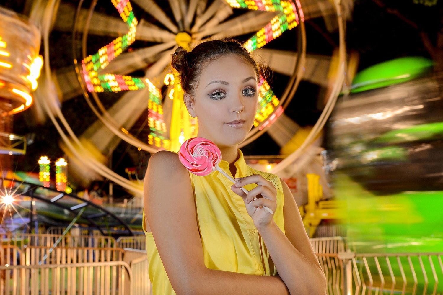 Dynamic carnival night shots with colorful lights and motion blur effects.