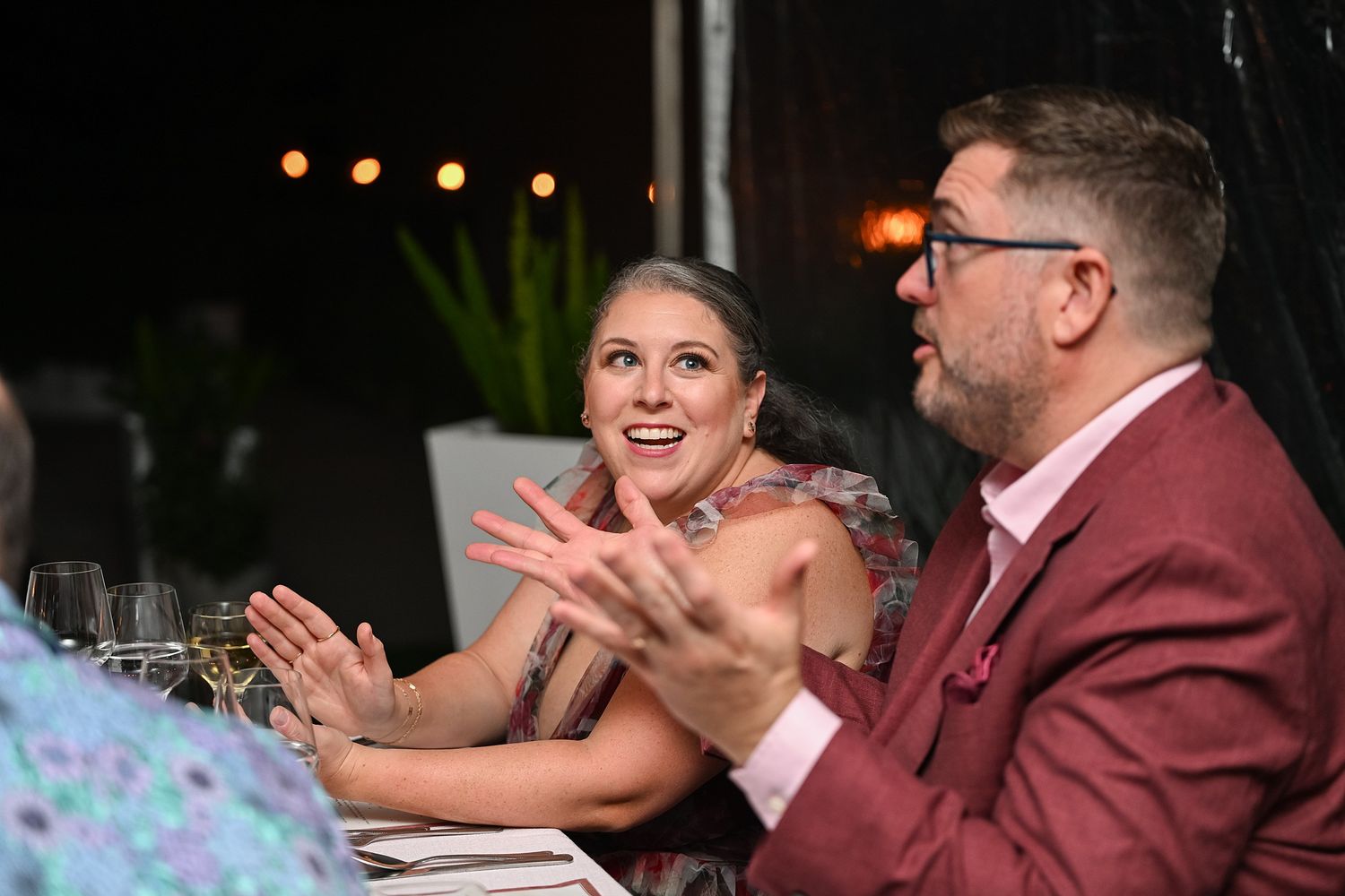 A sequence of candid reception photos showing joyful dancing and celebration at a wedding party.
