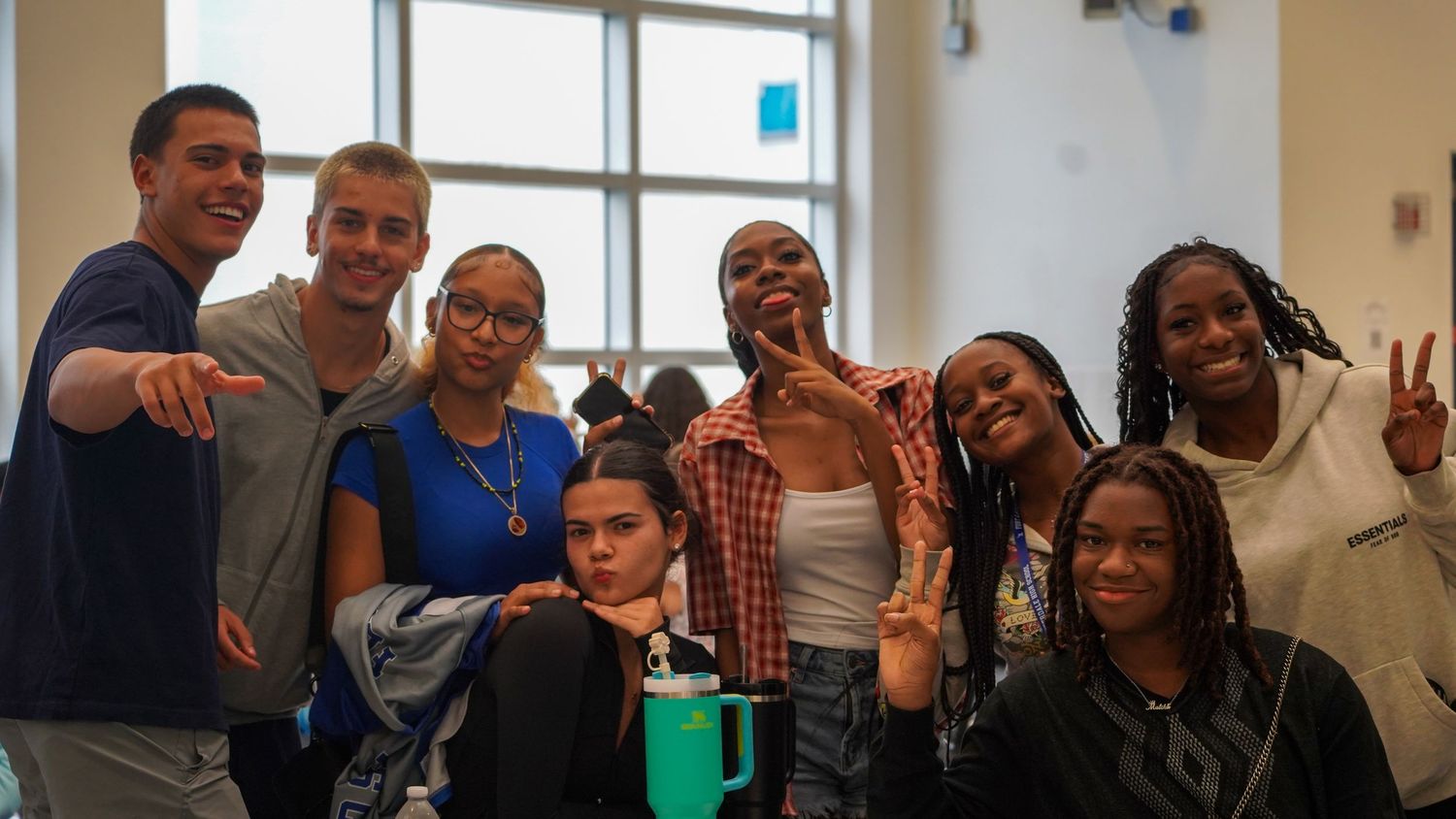 A panoramic view of students gathered in a classroom setting.