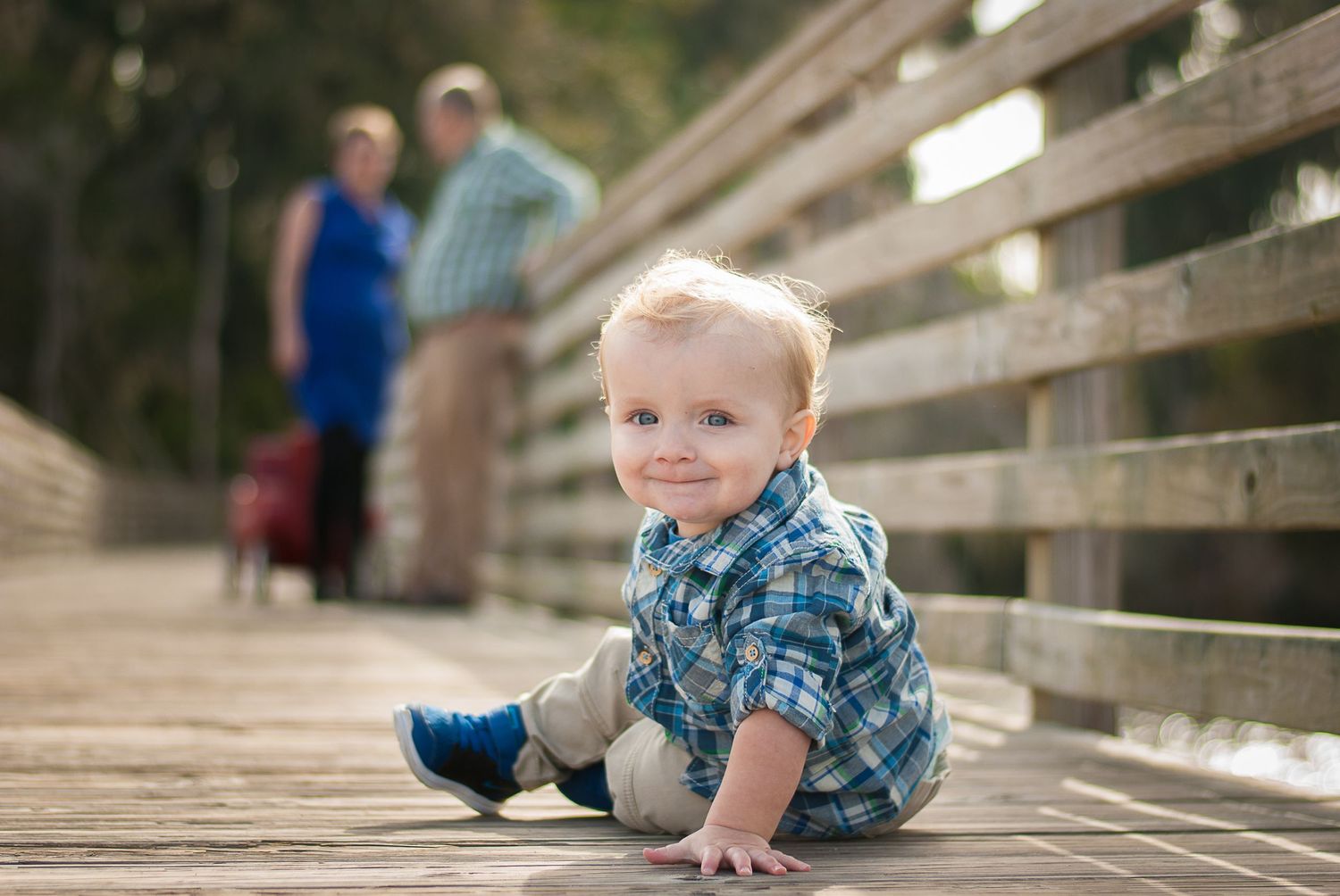 Toddler portrait on wooden boardwalk near the water — natural light family session by Alexandra Hall, St. Augustine FL