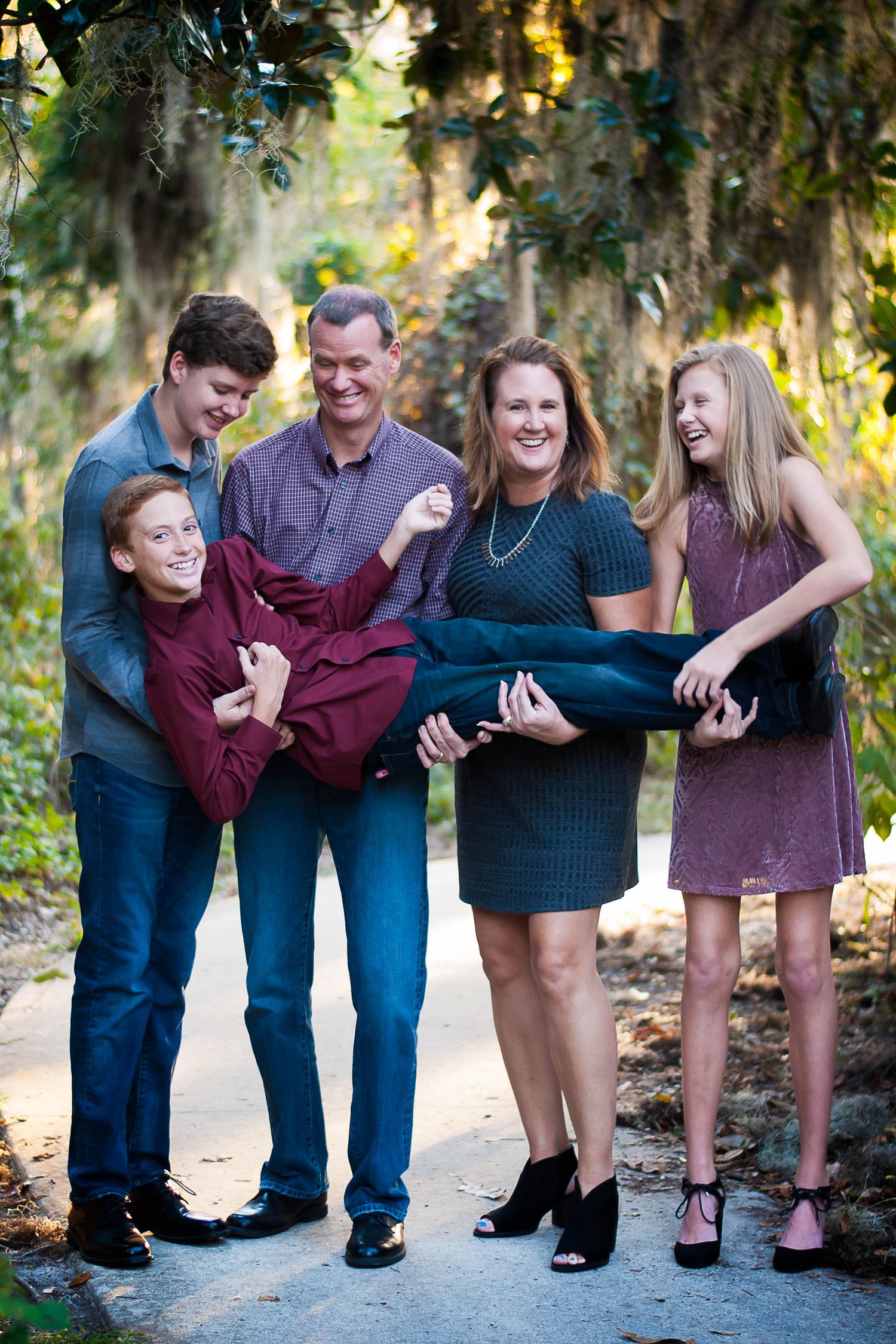 Family portrait under shaded trees — natural light outdoor session by Alexandra Hall, Jacksonville and St. Augustine FL