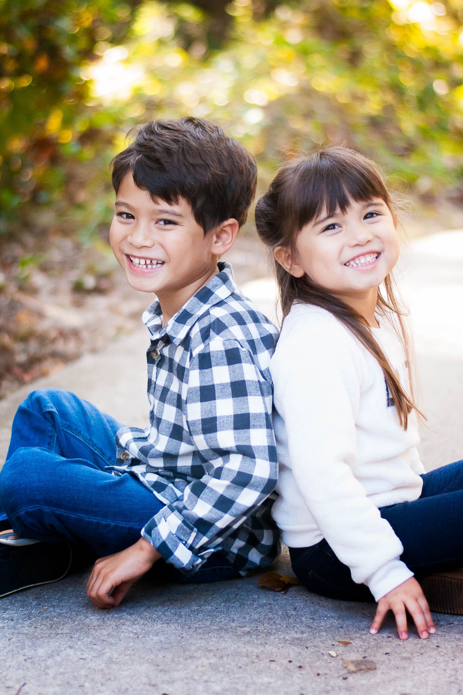 Candid sibling portrait session outdoors — natural light family photography by Alexandra Hall, Northeast Florida