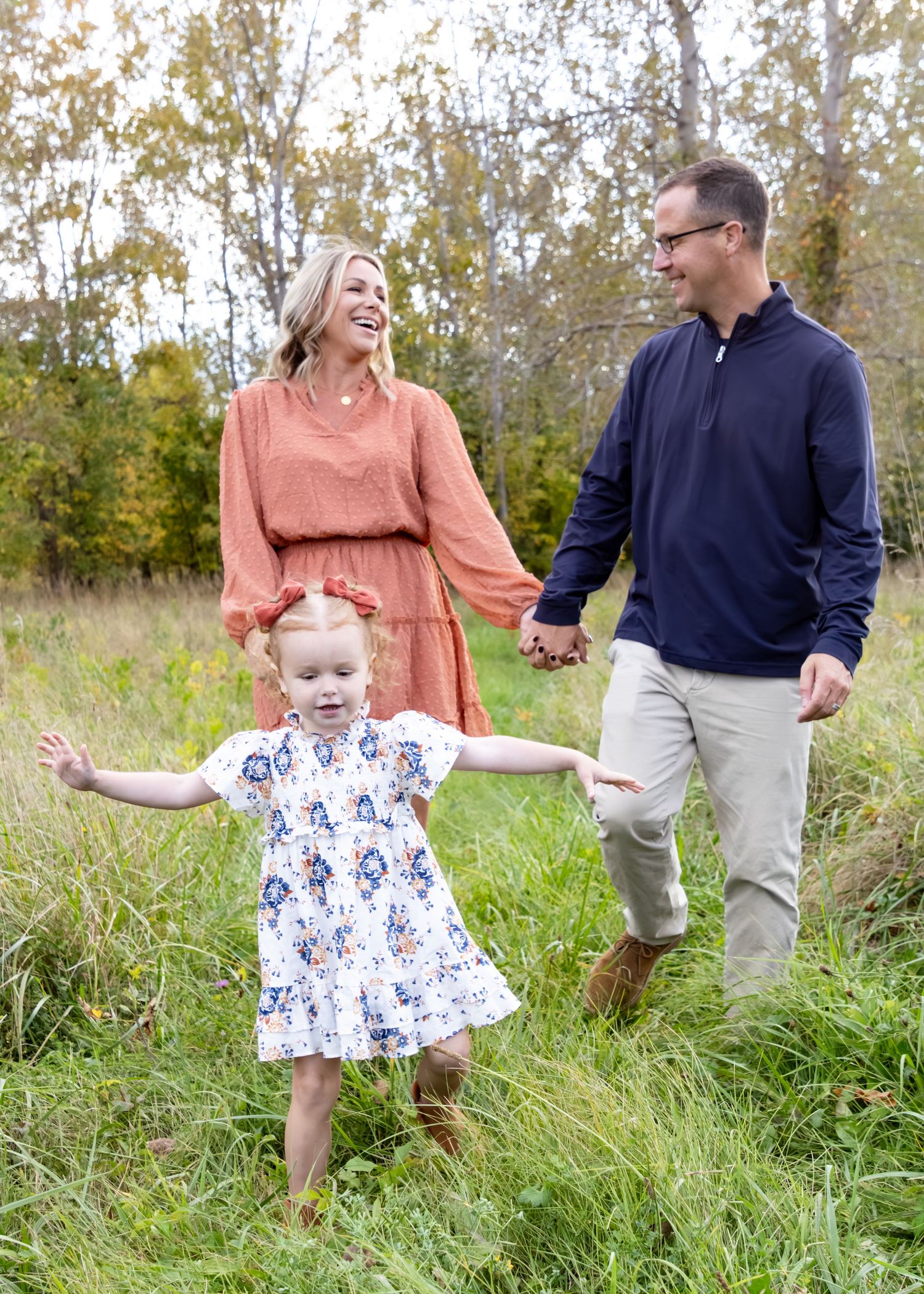 family photo session in Rochester NY with parents and young child