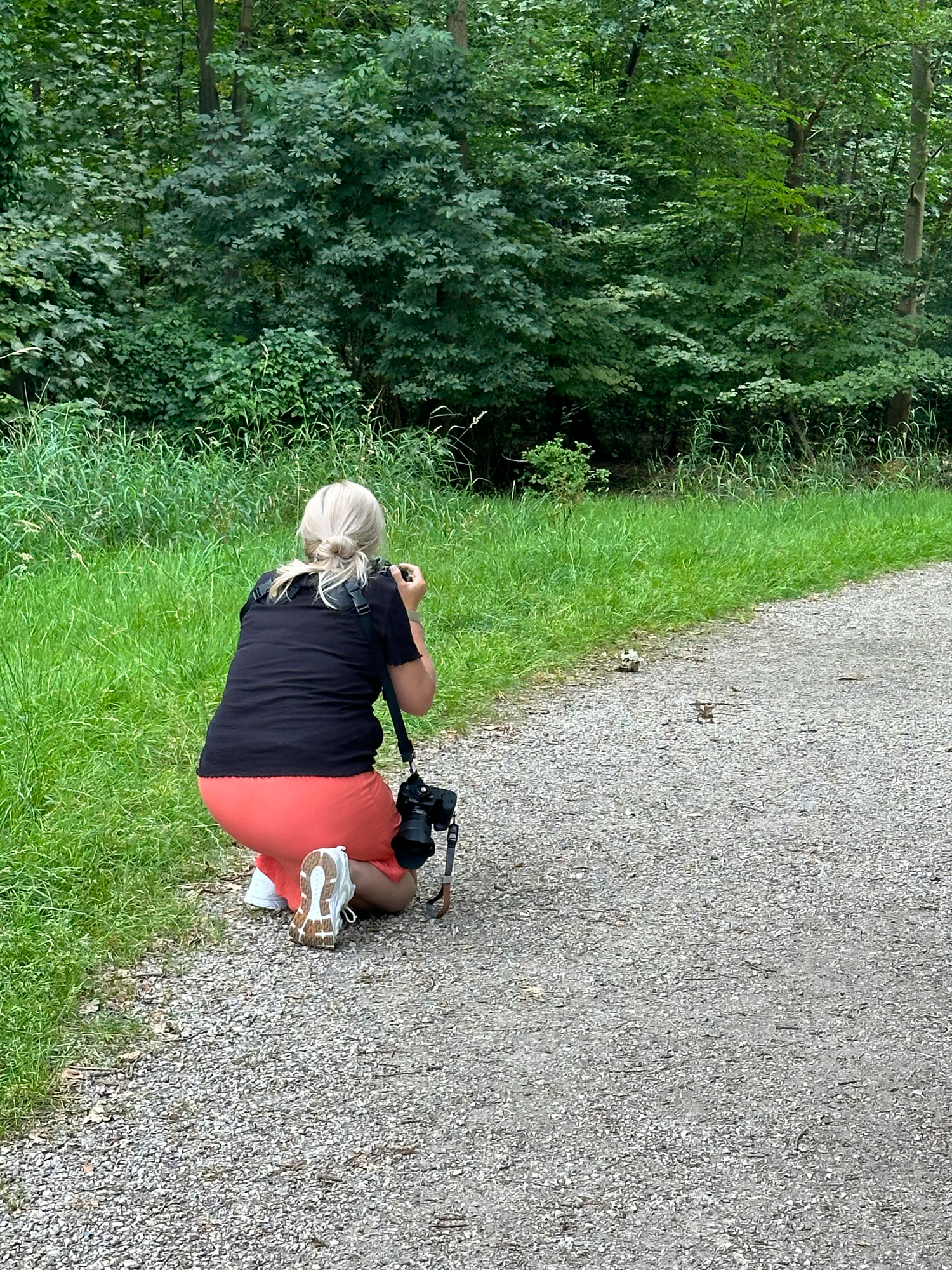 Linda, de fotograaf op sneakers