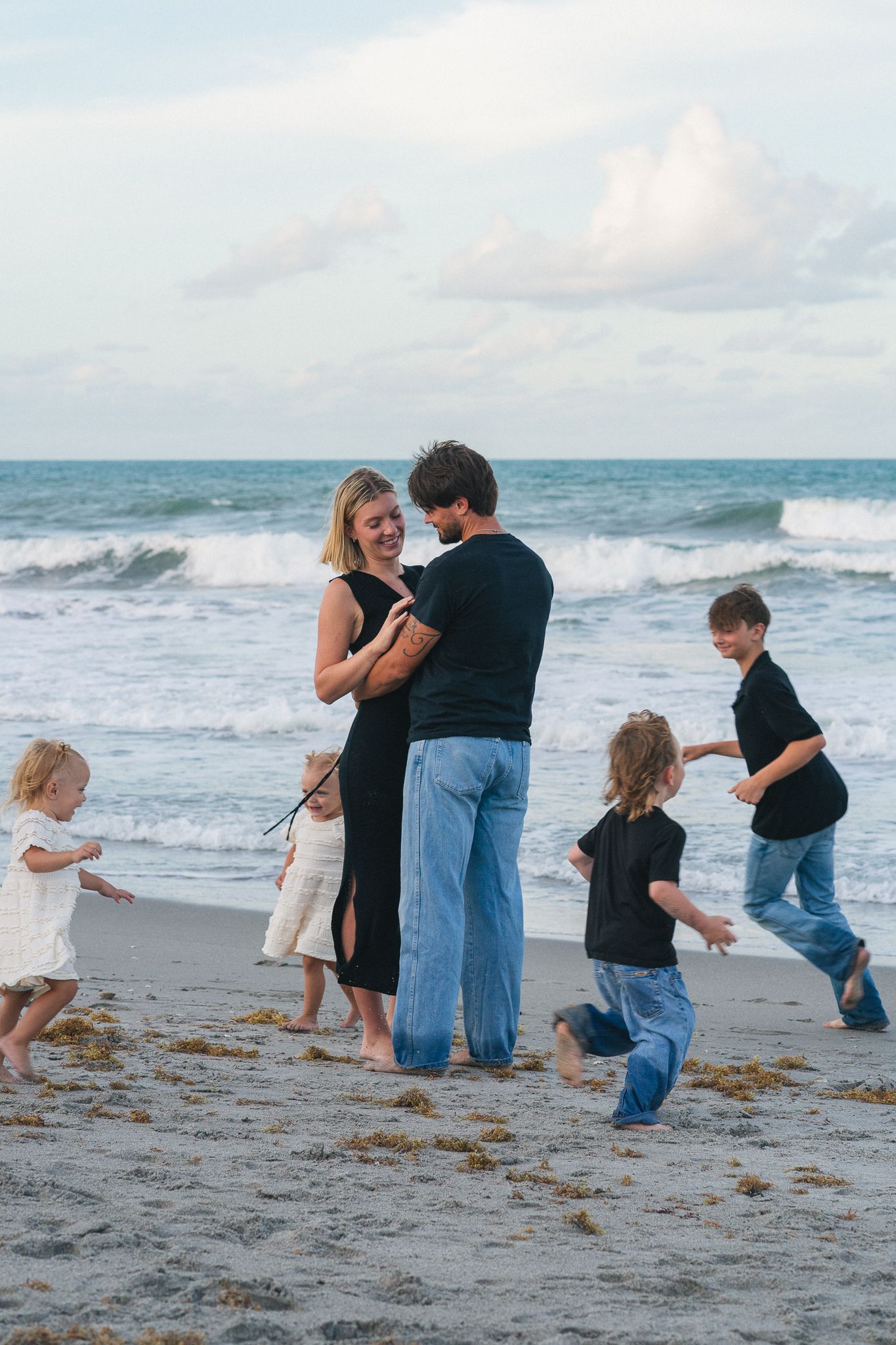 Family beach portraits in Brevard County, Florida - candid, light and airy