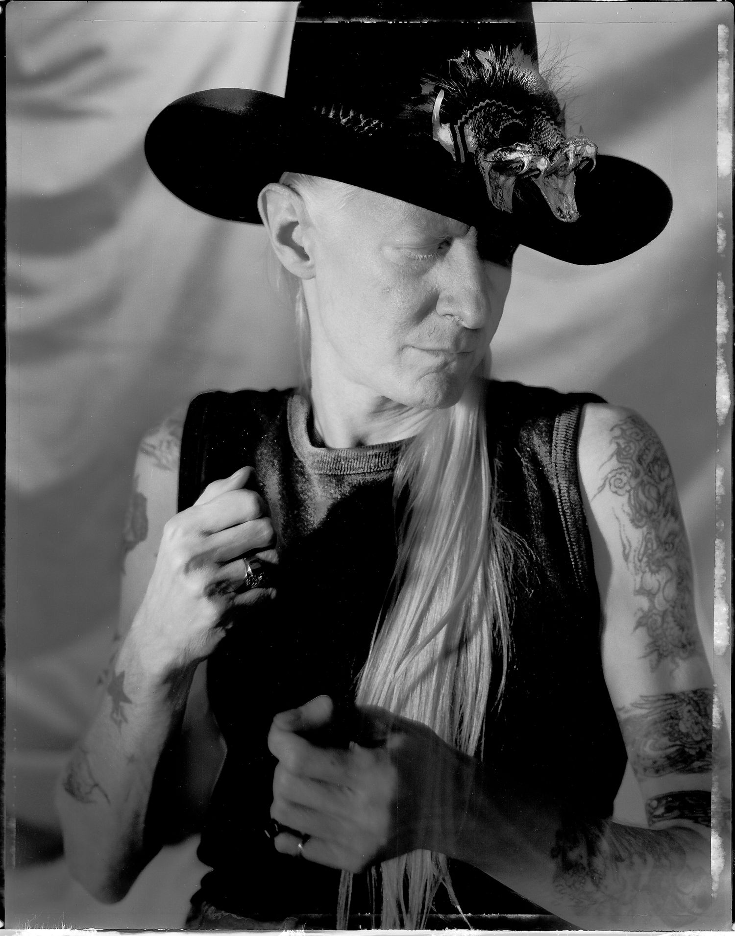 Johnny Winter, blues guitar player and singer with his 2 rattlesnakes hat, at the West 26th street studio, NYC.