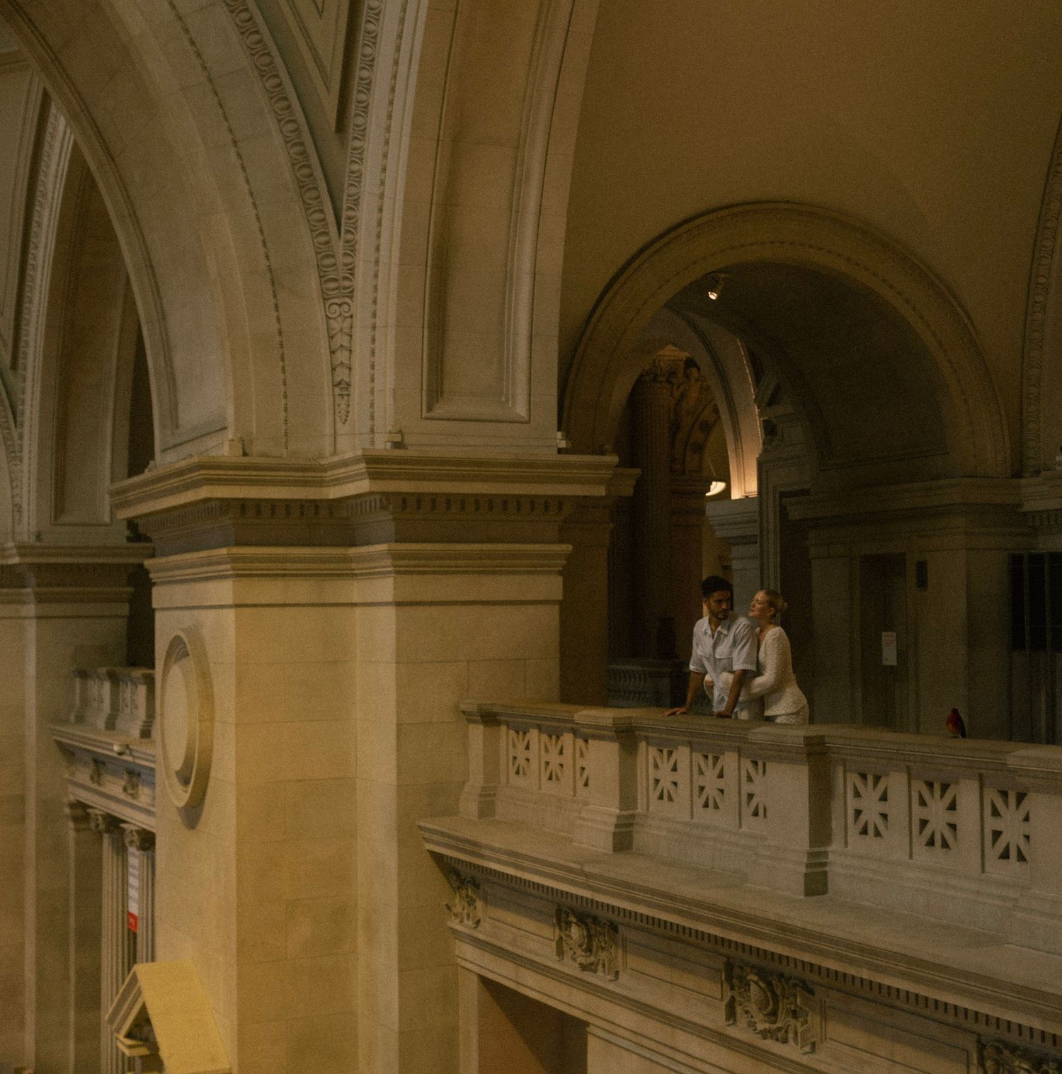 Ornate interior architecture of a grand historic building with arched ceilings and decorative moldings. NYC, The Met.