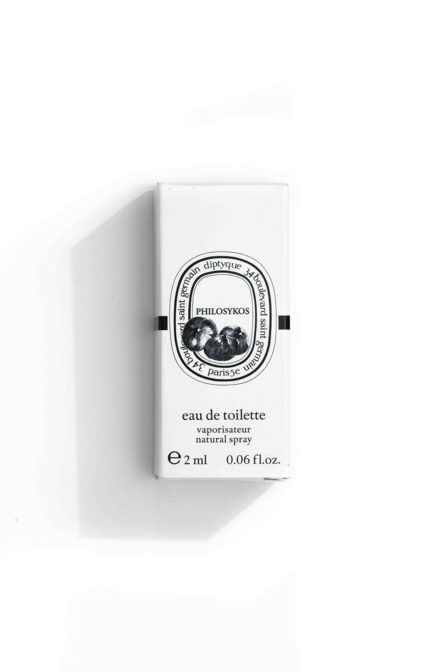 Product flat lay on white background with a hard shadow